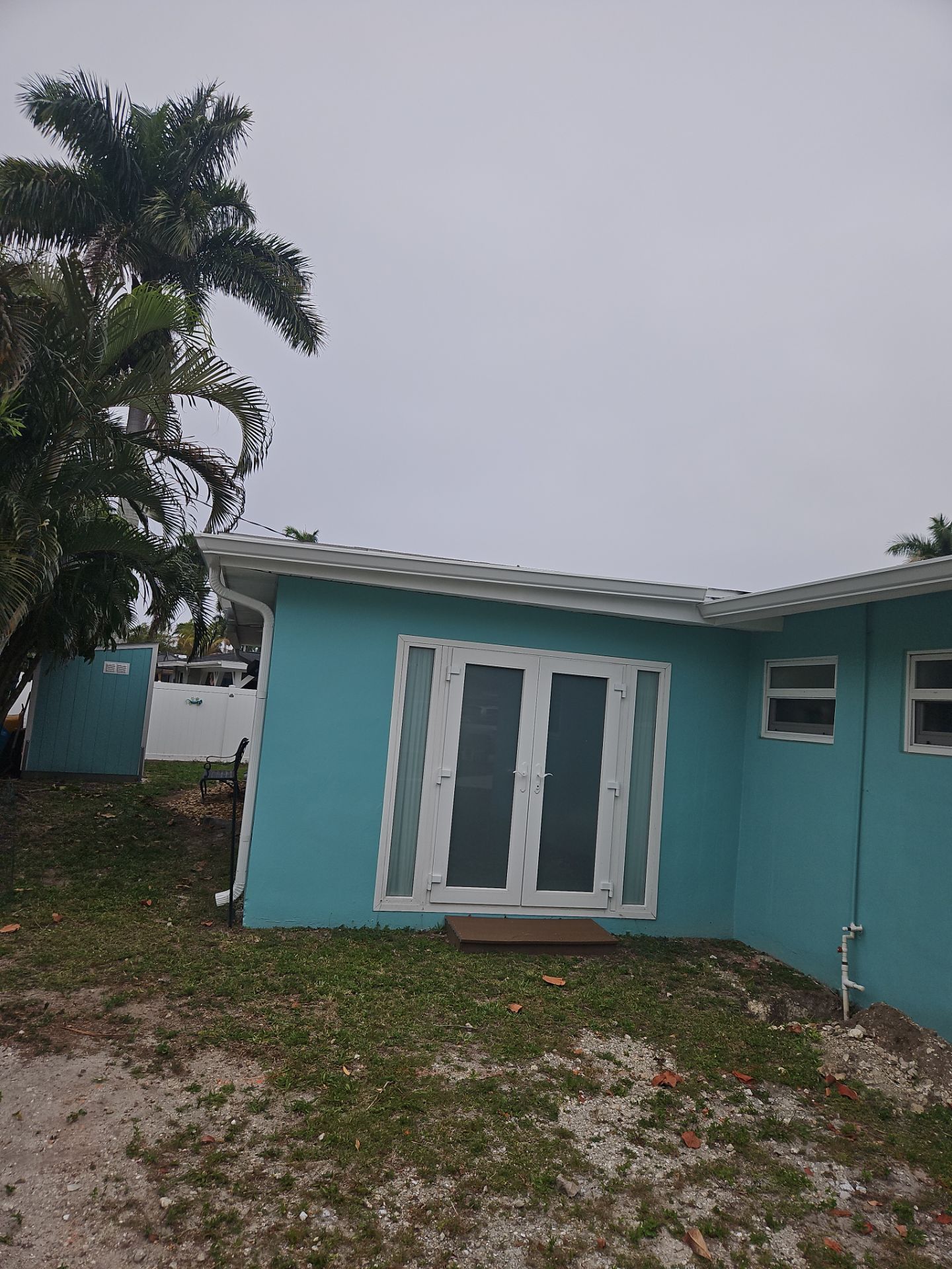 White K Style Seamless Gutters using 6 Inch Seamless Gutters with Downspouts in Fort Myers FL by Gutter Professors