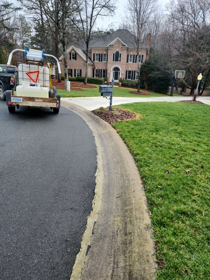 Driveway Clean using cleaner by Power Wash Masters LLC