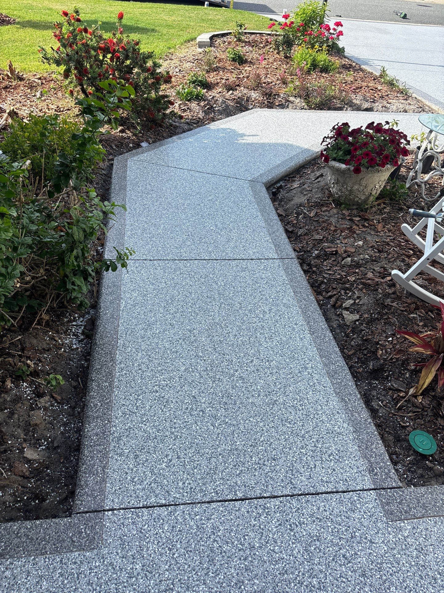 Driveway & Sidewalk Slatestone with Silvercreek borders by Innovative Concrete Coatings 