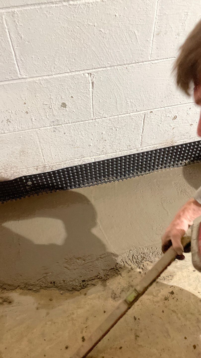 Drain tile & a sump pump for Ruth by Waterproofing Northeast