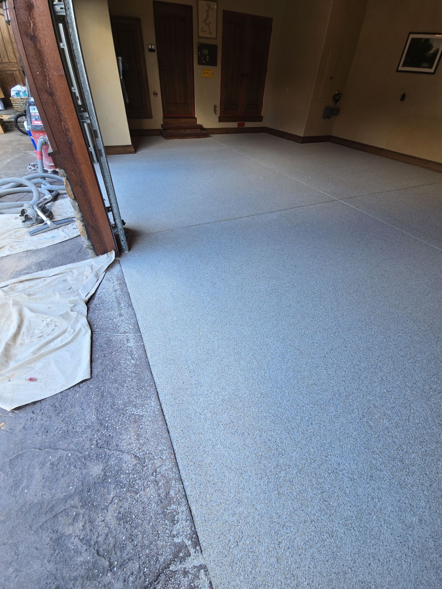 Garage Transformation using Stone/Marble Hybrid by Croc Coatings, LLC