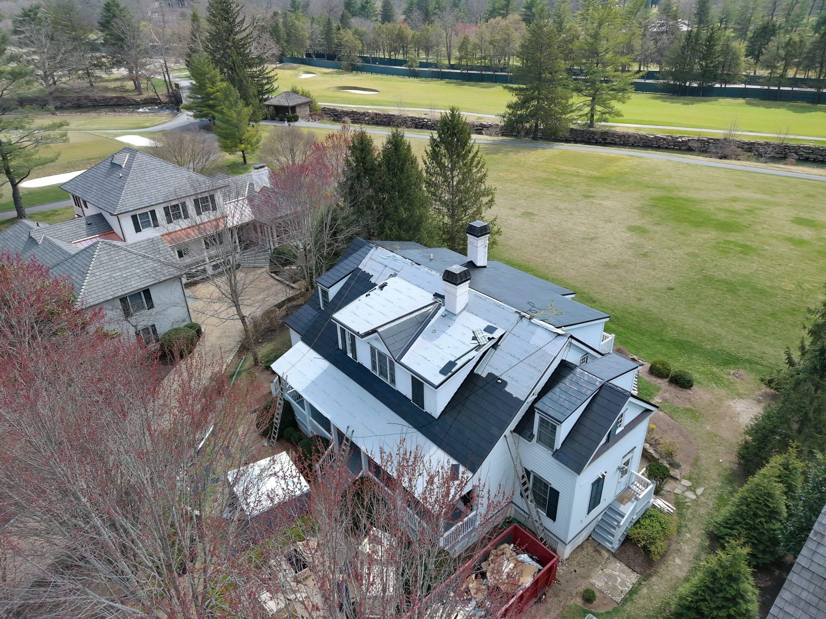 Tesla Solar Roof using Tesla Solar Roof by American Home Contractors