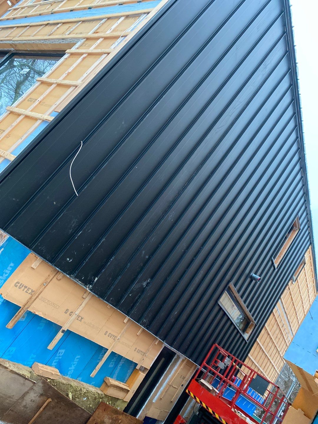 New Home Construction using 16" Standing Seam Panels by Jay Carter Roofing & Sheet Metal