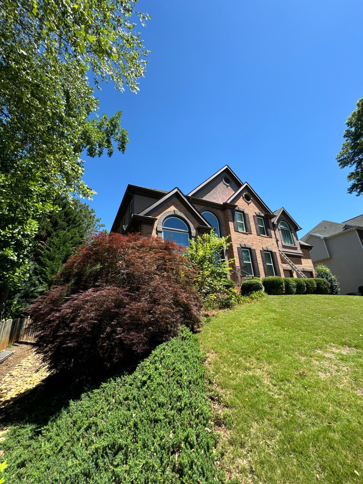 Full Exterior Painting and Gutter Replacement for Powder Springs Home by Swift Home Renovations