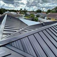 24ga 1.5" Mechanical Seam Dark Bronze by Total Roofing System The Metal Roof Experts
