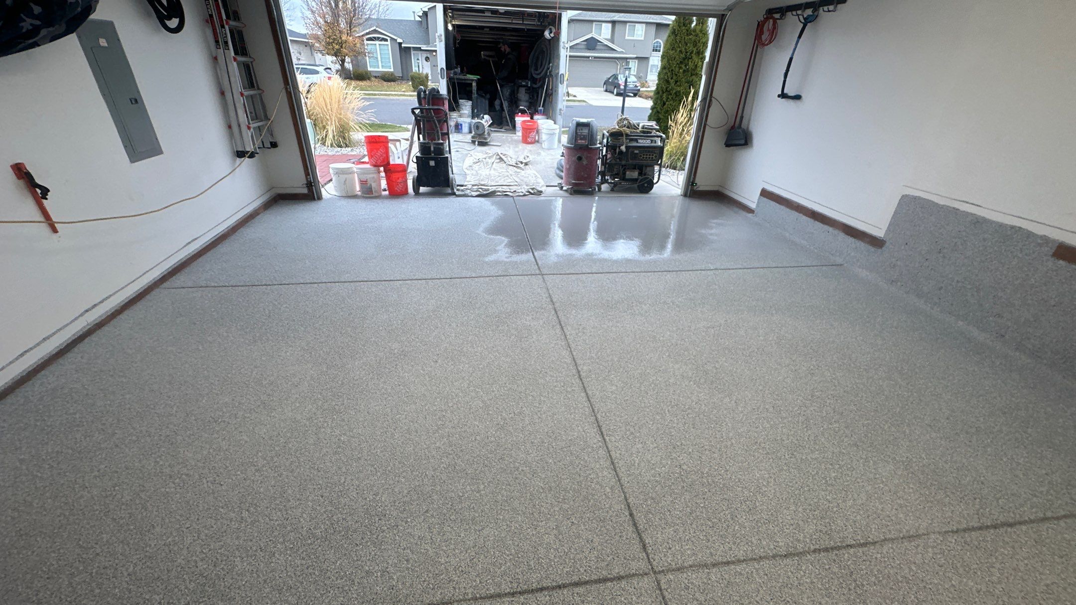 Garage Transformation using 1/8 Tidal Wave by Croc Coatings, LLC