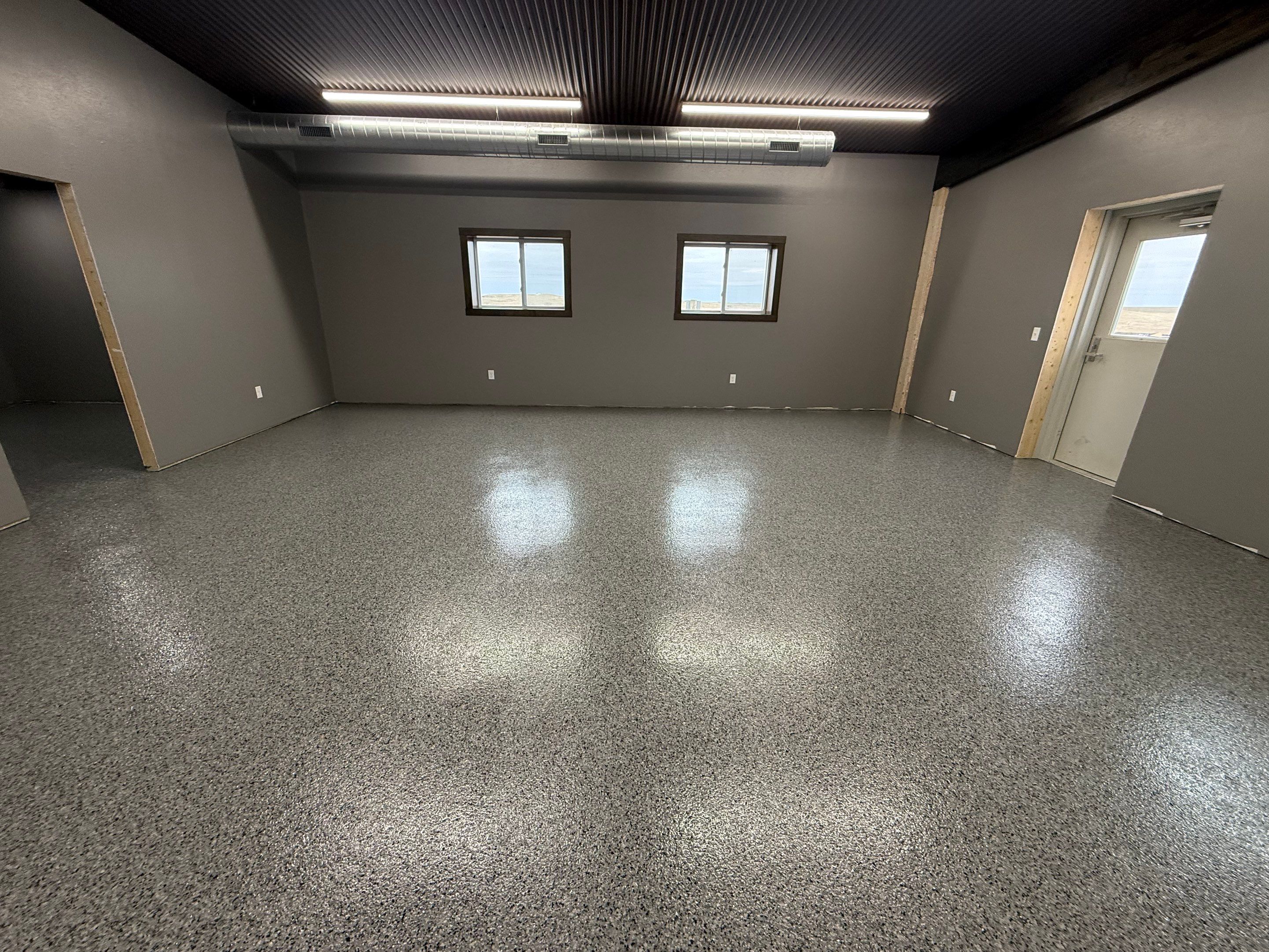 Nightfall Flake Floor Coating Installation in Draper by Select Painting, Coatings & Garage Cabinets