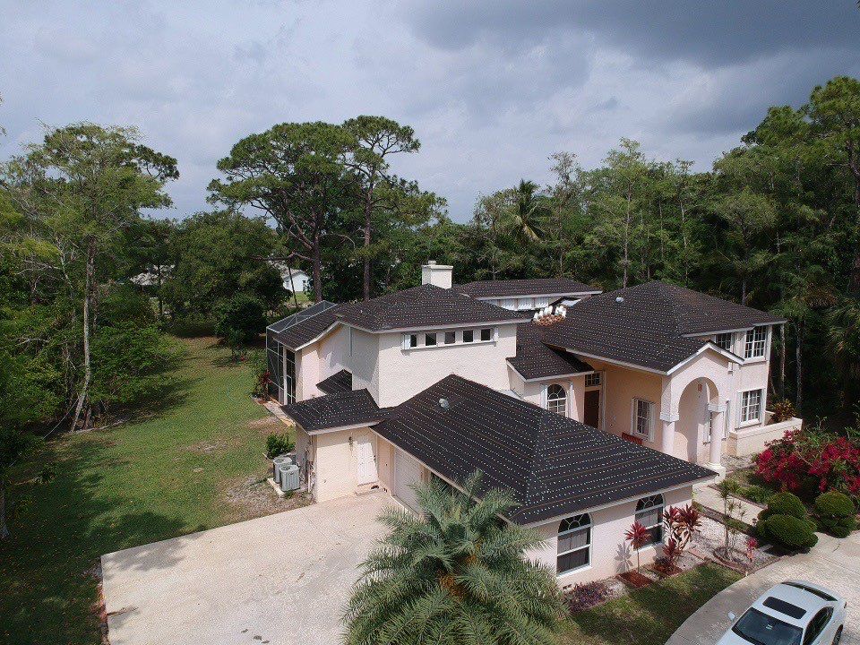 Residential Roofing Installation using 1" Nail strip metal roof by BLUES BROTHERS CONSTRUCTION CORP