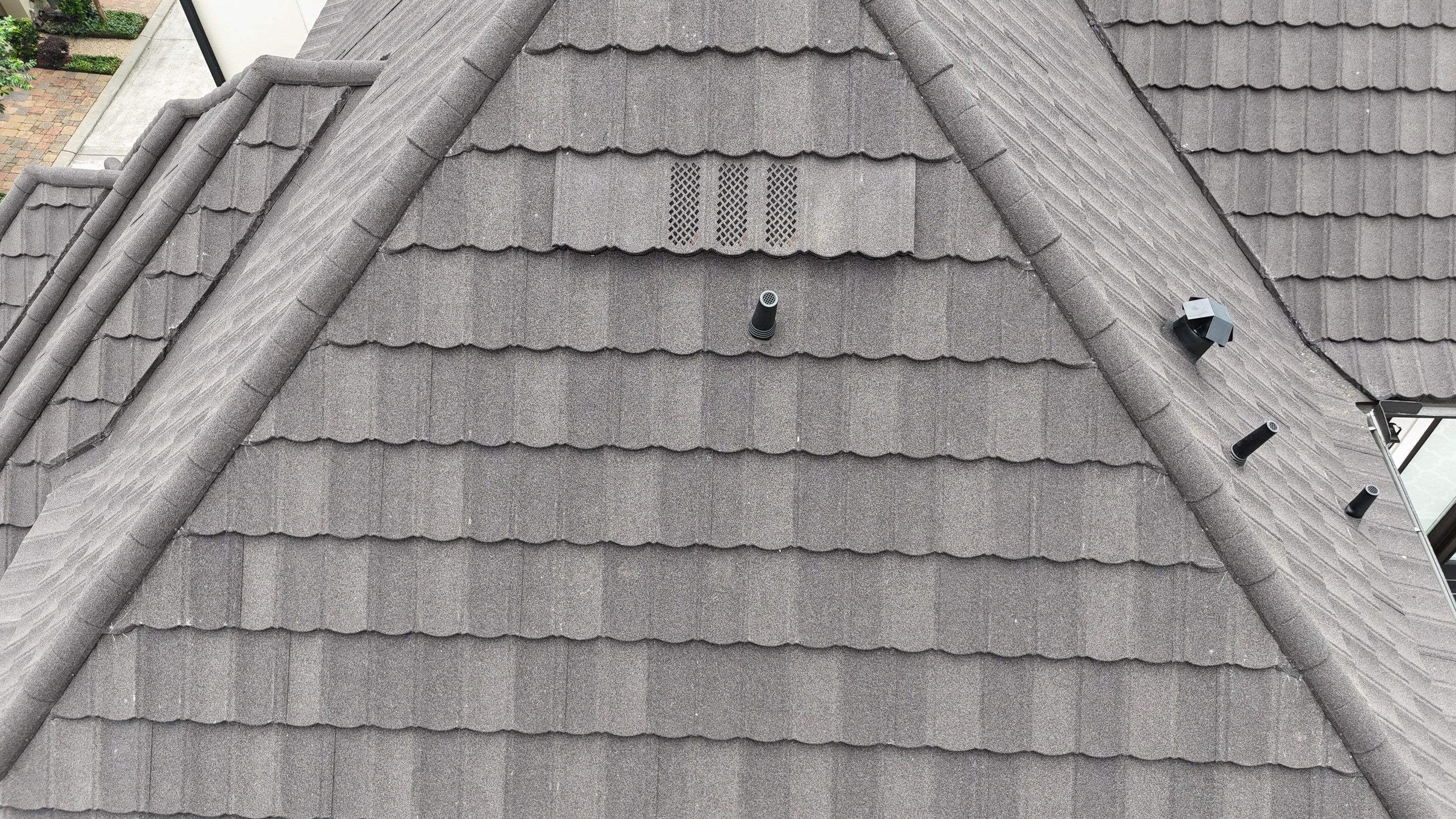 Stunning transformation from Shingles to DECRA Tile by Core Four Roofing