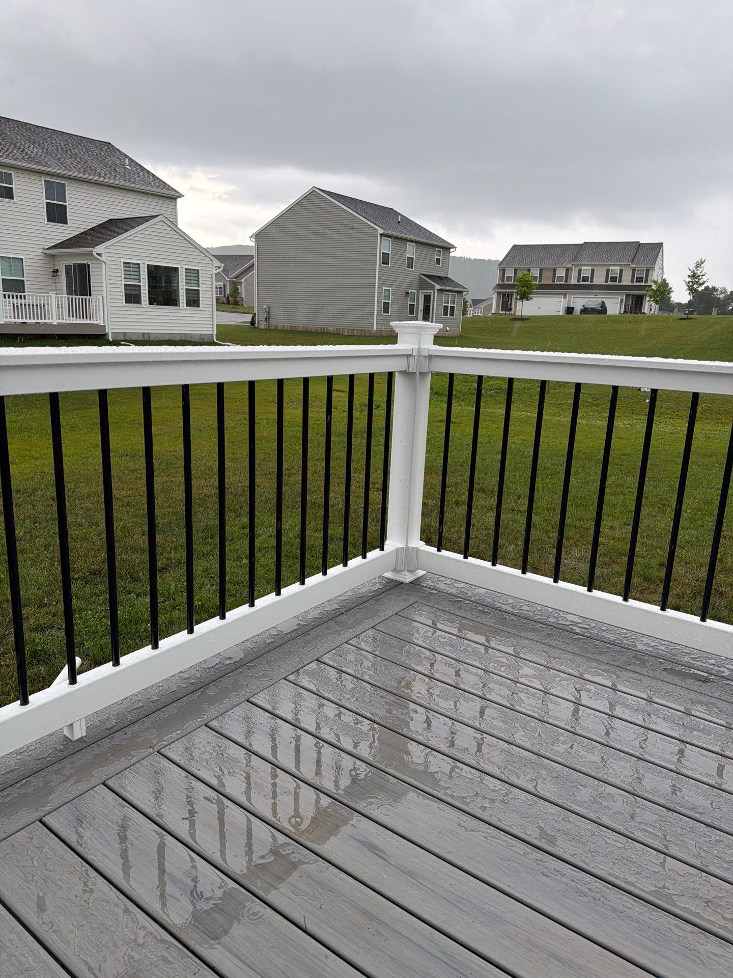 Custom Gray Composite Deck Installation in Duncannon by Esh Builders