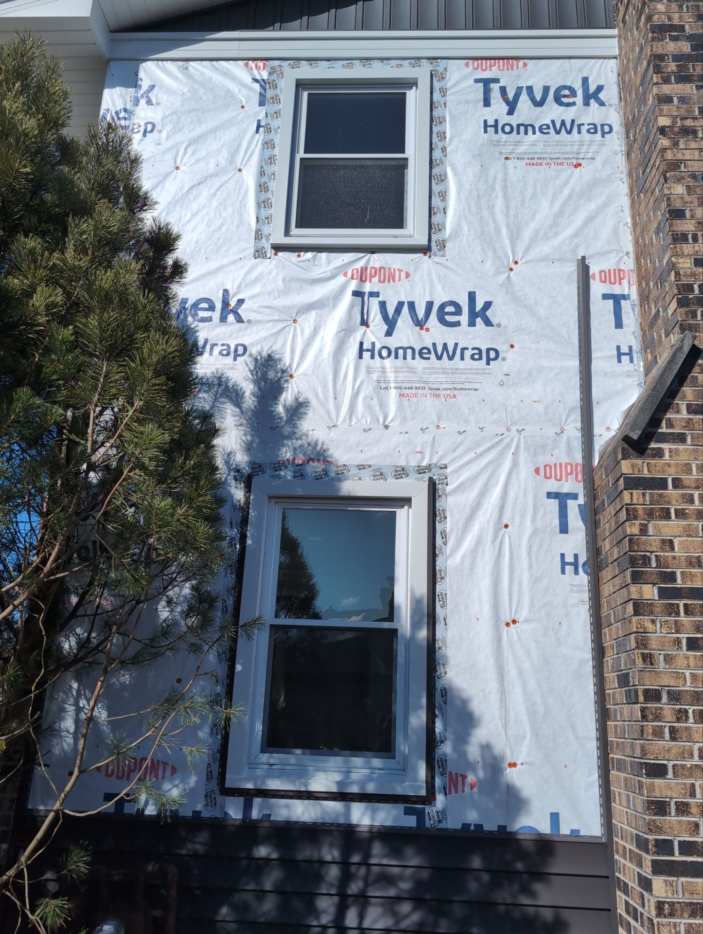 Vinyl siding replacement using CertainTeed Monogram double 5" vinyl siding  by AJ Exteriors & Roofing Inc.