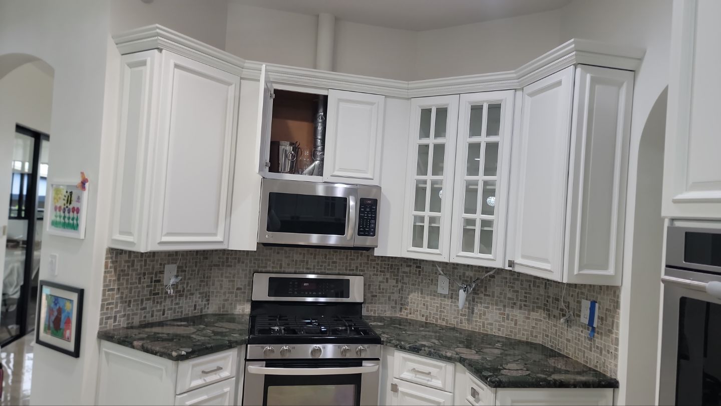 Kitchen Cabinet Just Like New by John “The Greek” Painting