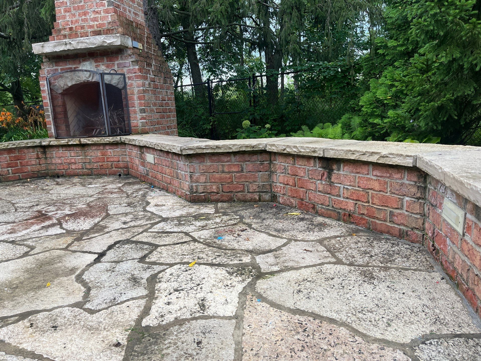 natural stone using Algaecide, soft wash soap by Northern Power Washing LLC.