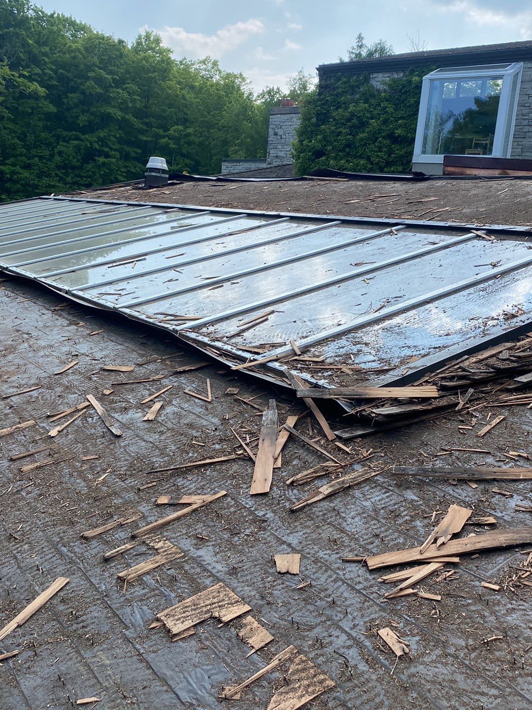 Roof Replacement using 16" Standing Seam Panels by Jay Carter Roofing & Sheet Metal