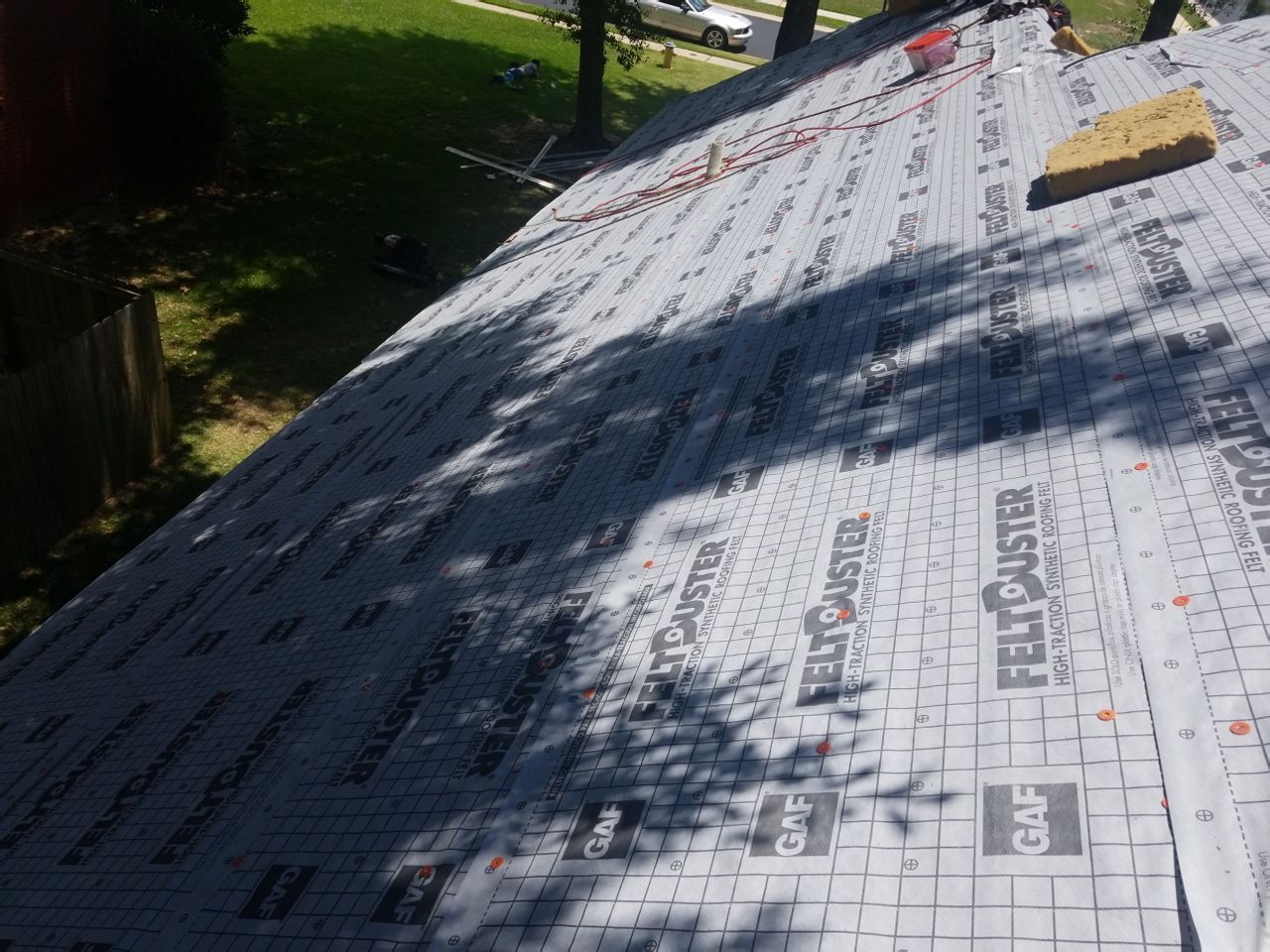 Residential Roofing Installation using Roof Replacement by American Roofing & Construction LLC