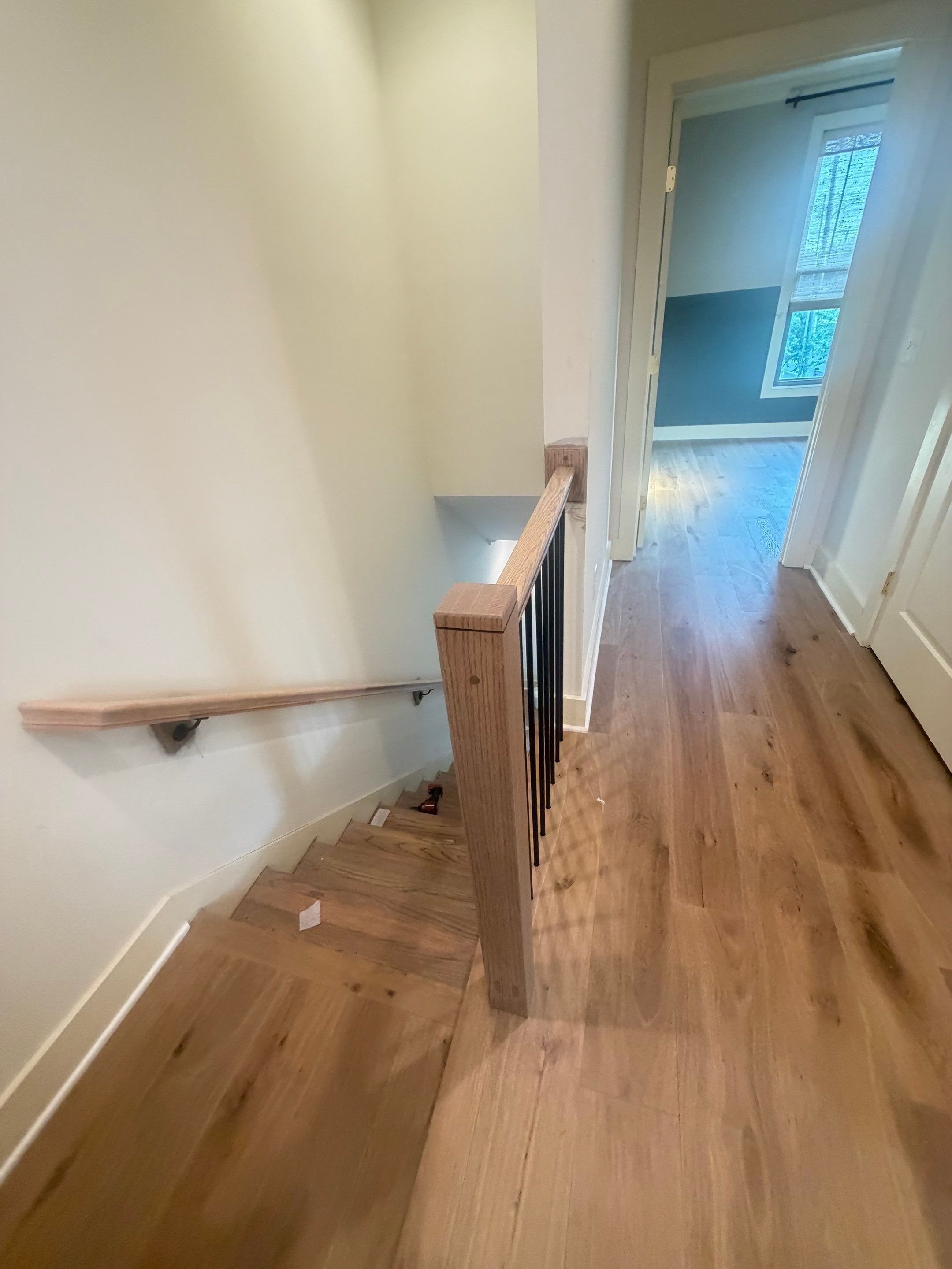 White Oak Hardwood and Checkerboard Tile Installation by Footprints Floors of Nashville