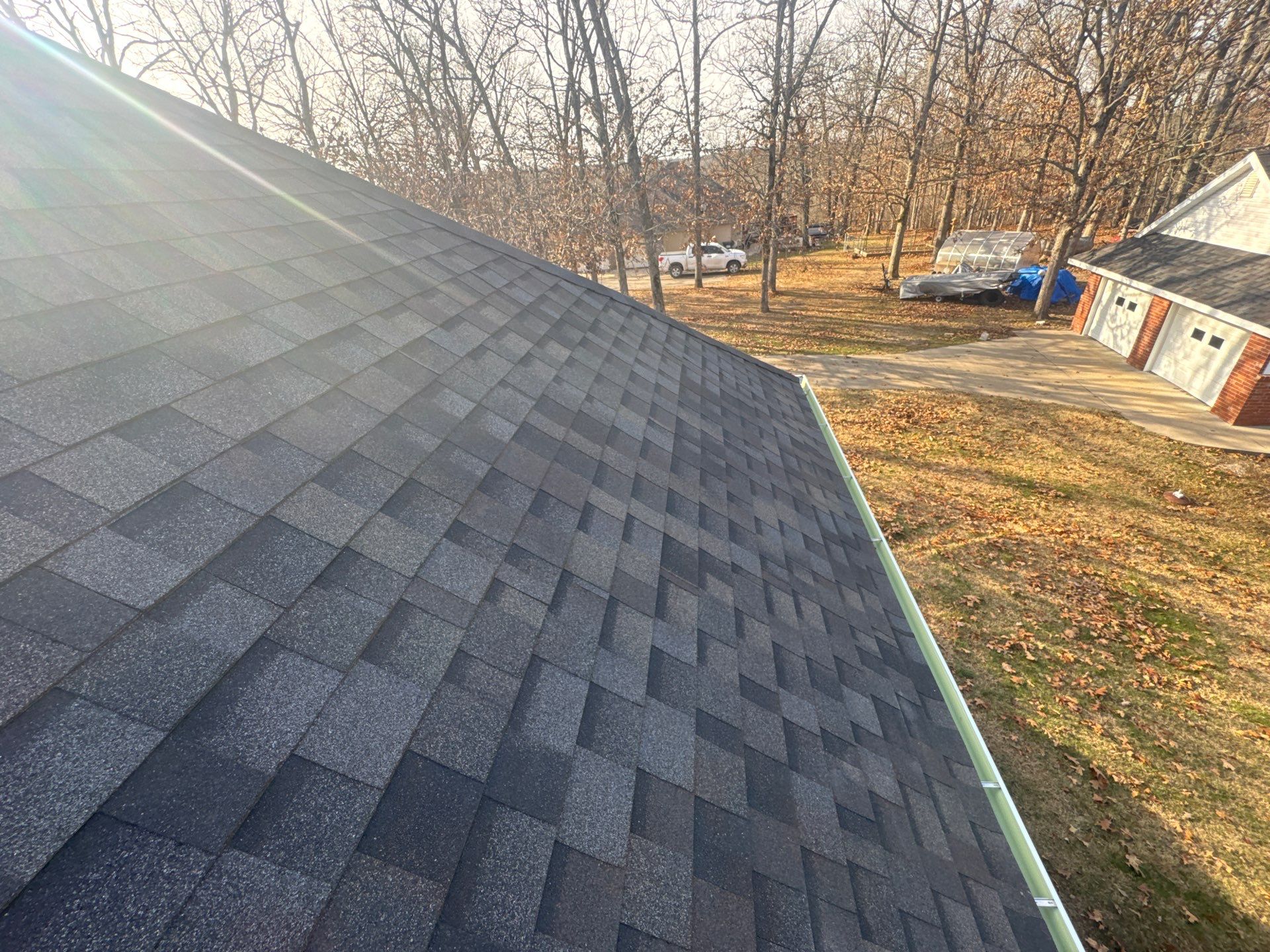 Residential Partial Roofing + Gutters & Downspouts Install  by Titan Commercial & Residential Roofing 