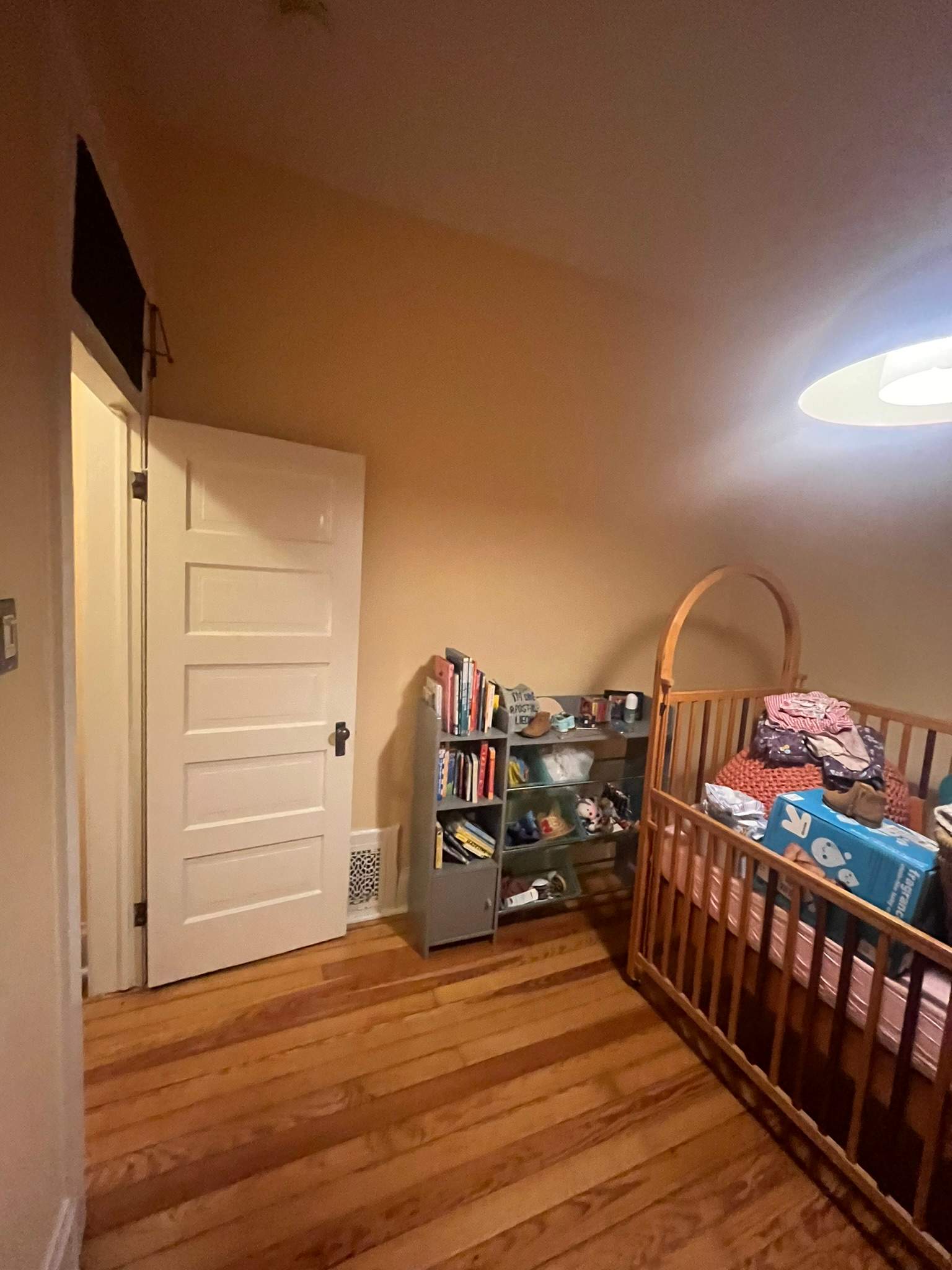 Denver Nursery Renovation Featuring Custom Shiplap and Floral Wallpaper by LP Construction Services