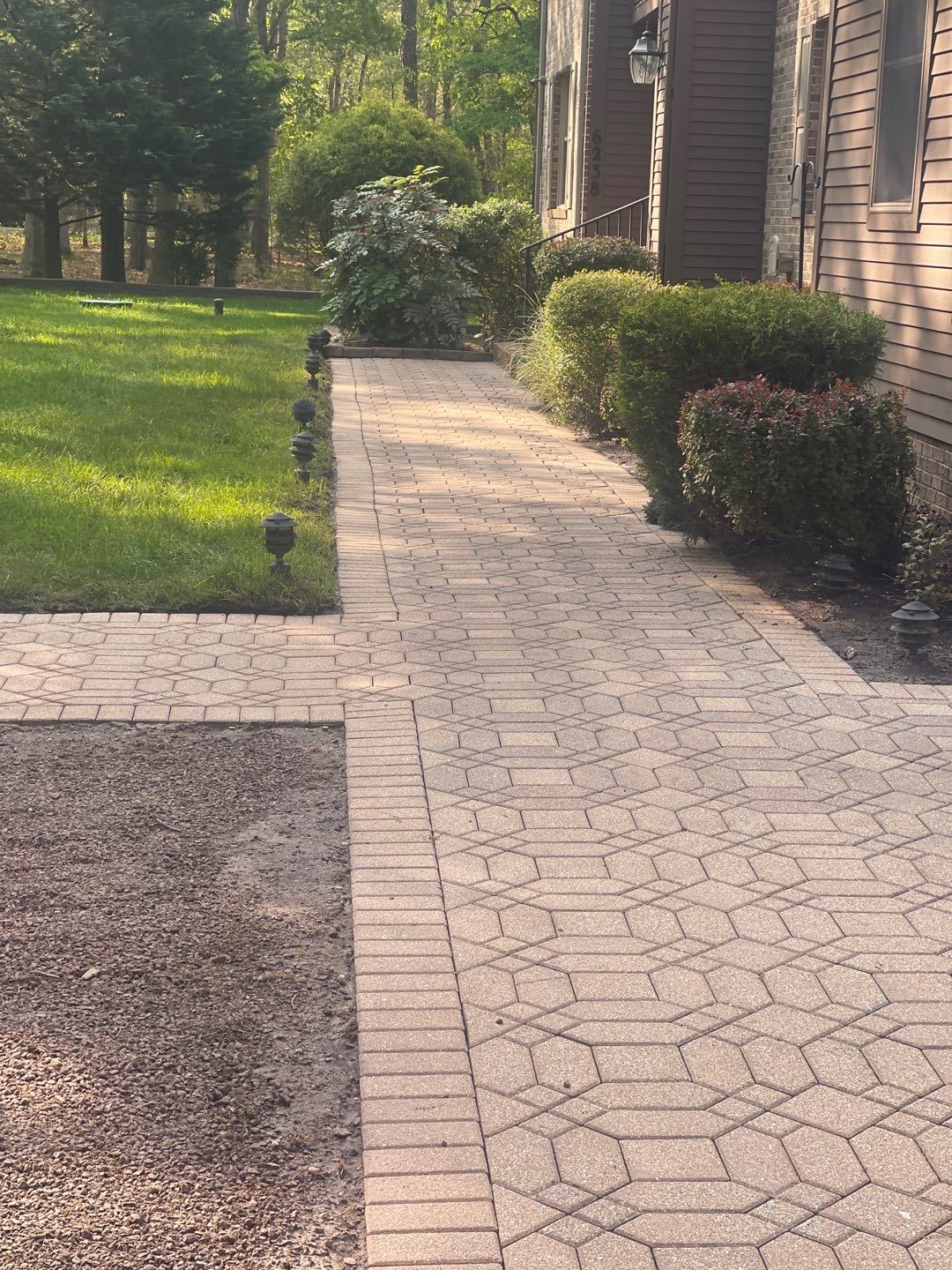 Pavers Cleaned, Garage and Concrete walls by SJ Exterior