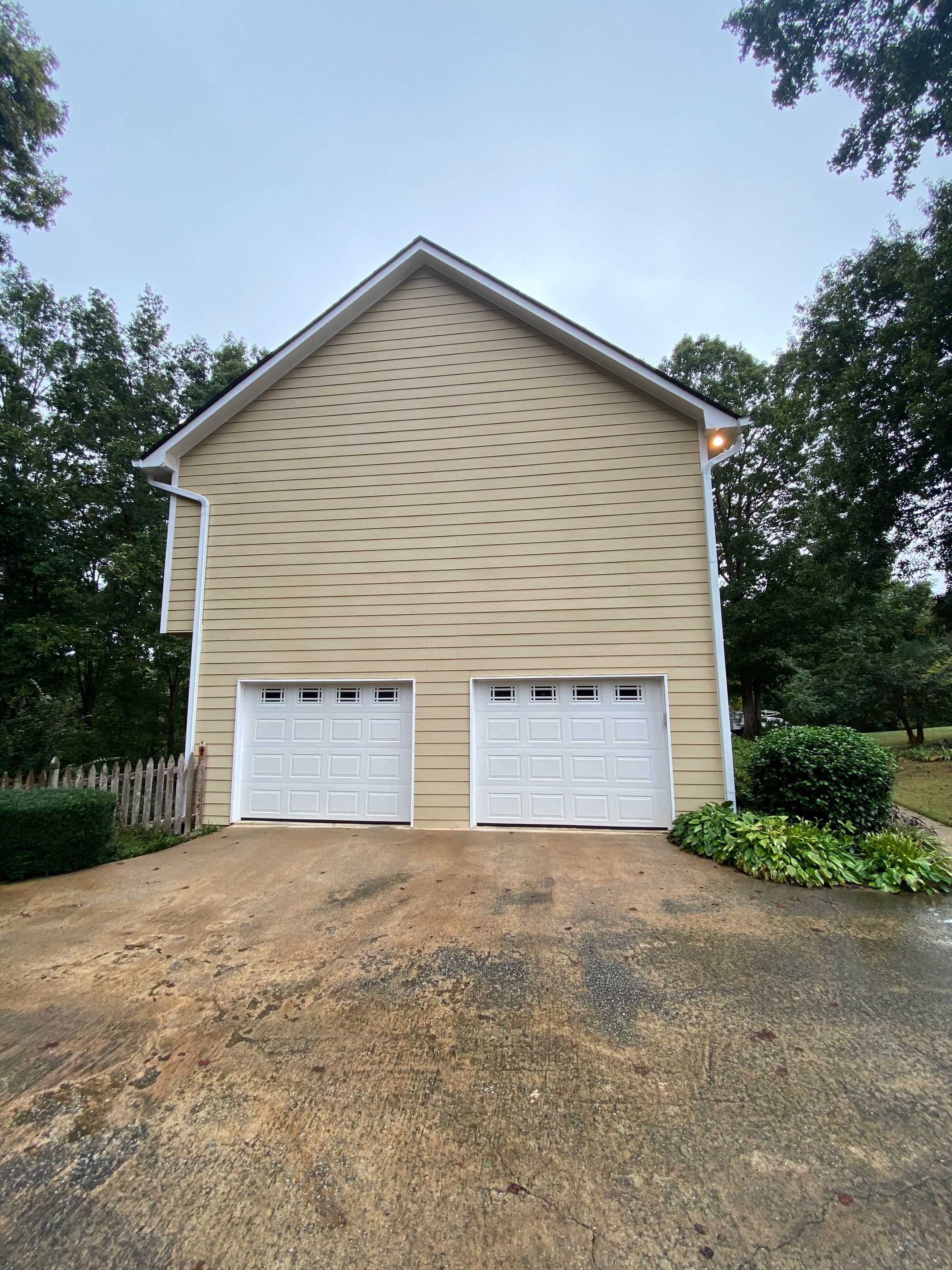 Full Exterior House Painting for Suburban Residence in Douglasville by Swift Home Renovations