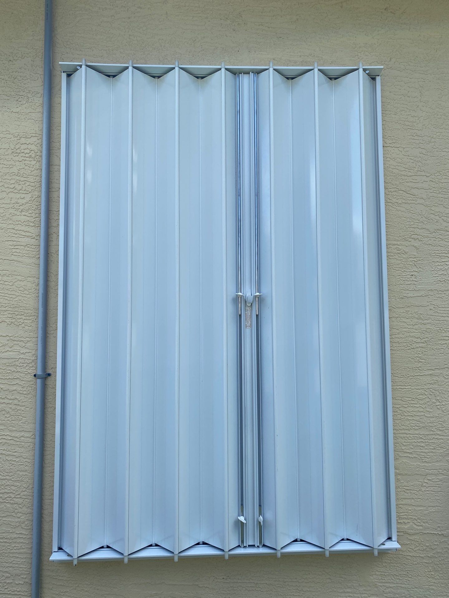 Accordions in White by Smart Guard Shutters