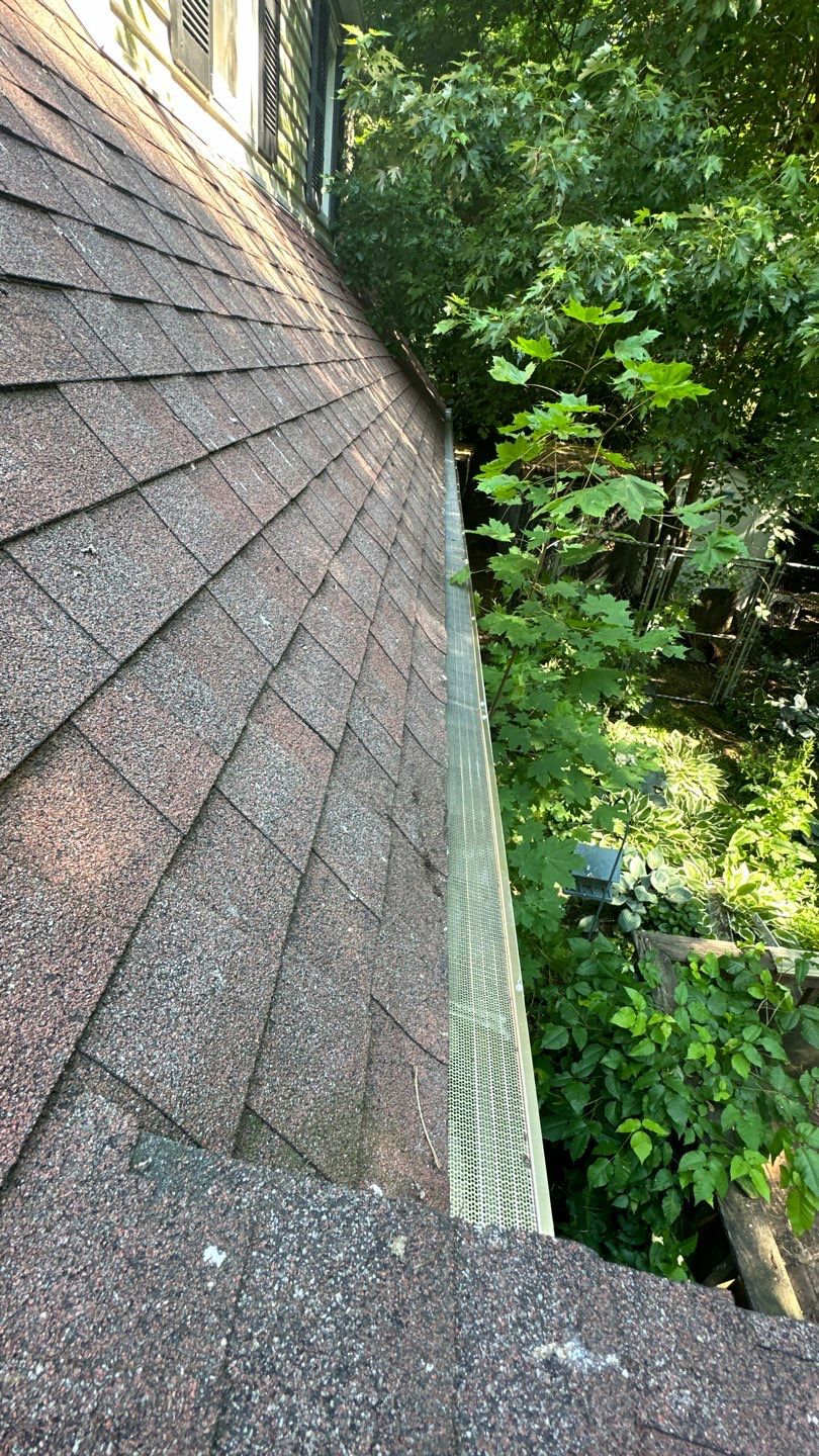 Very overdue gutter cleaning and screening by Above All Gutters 