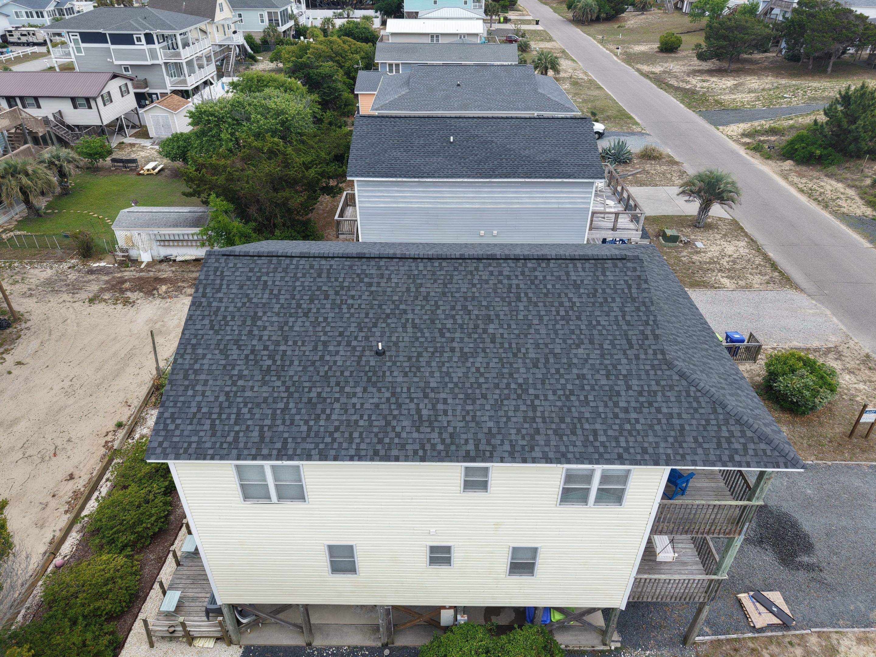 Oak Island Roof Replacement with CertainTeed Landmark PRO Moire Black by RGR Construction and Roofing, LLC