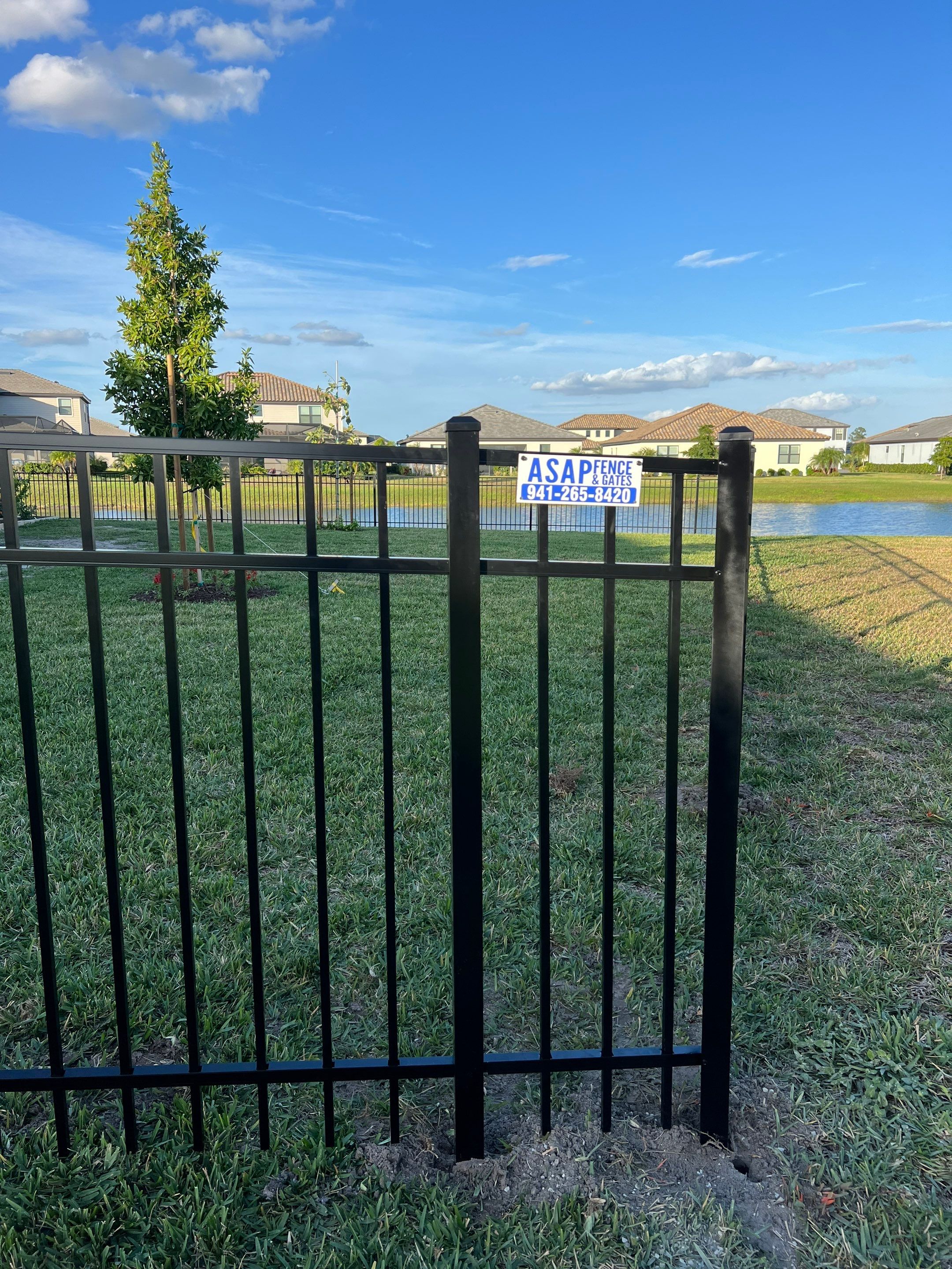 Aluminum Fence Installation using Black 3 Rail Aluminum Fence by Asap fence and gates, LLC