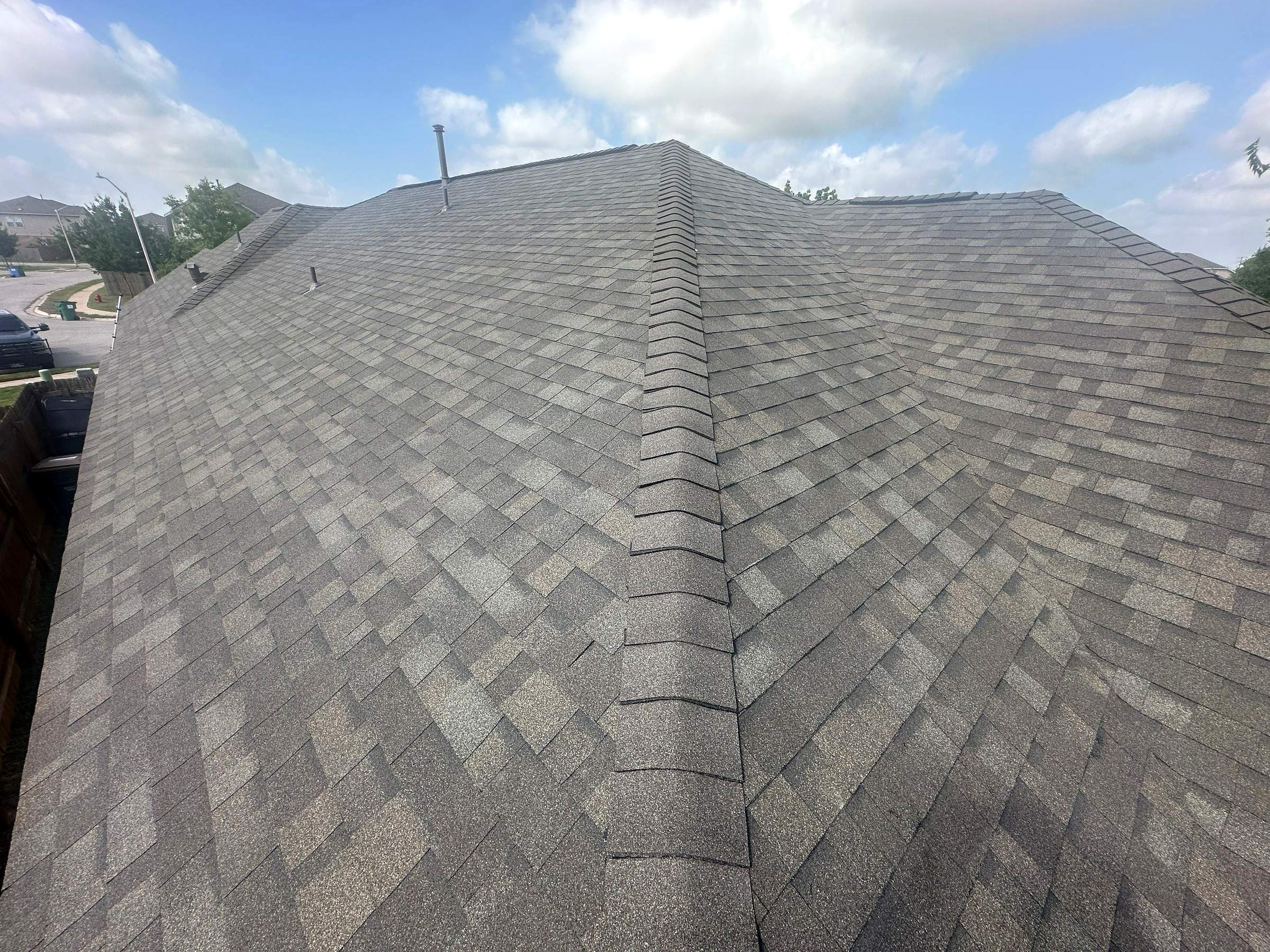 Oakridge Driftwood Roof Replacement in Buda by Skywall Construction LLC