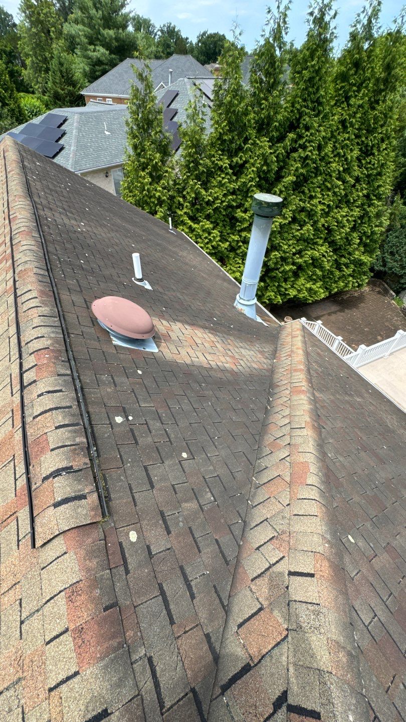 McLean: Residential Roof Installation with Landmark Pro Designer Shingles in Max Def Moire Black by RM Banning, Inc.