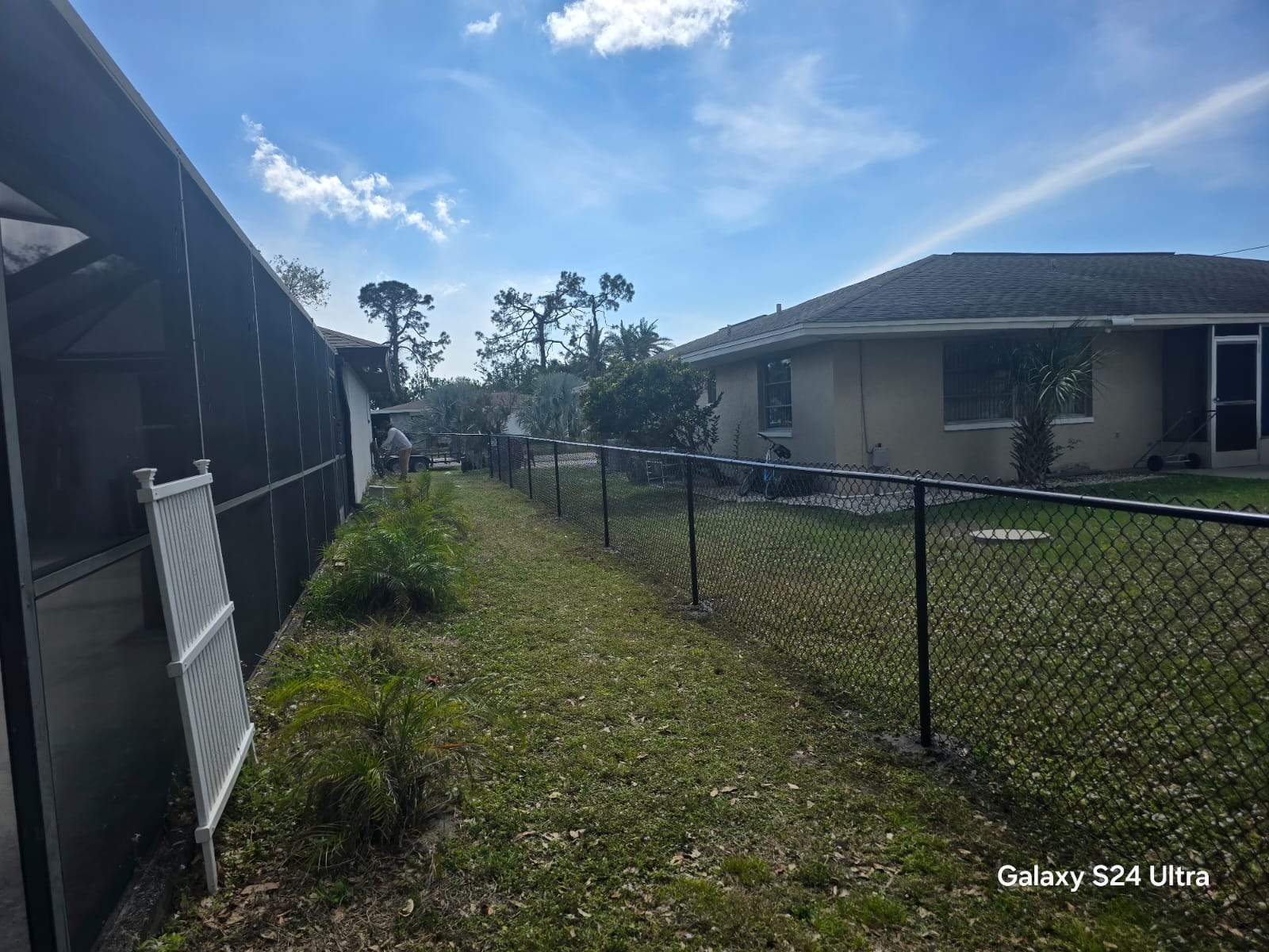 Black Chain Link Fence Installation for Port Charlotte Residence by True Fence LLC