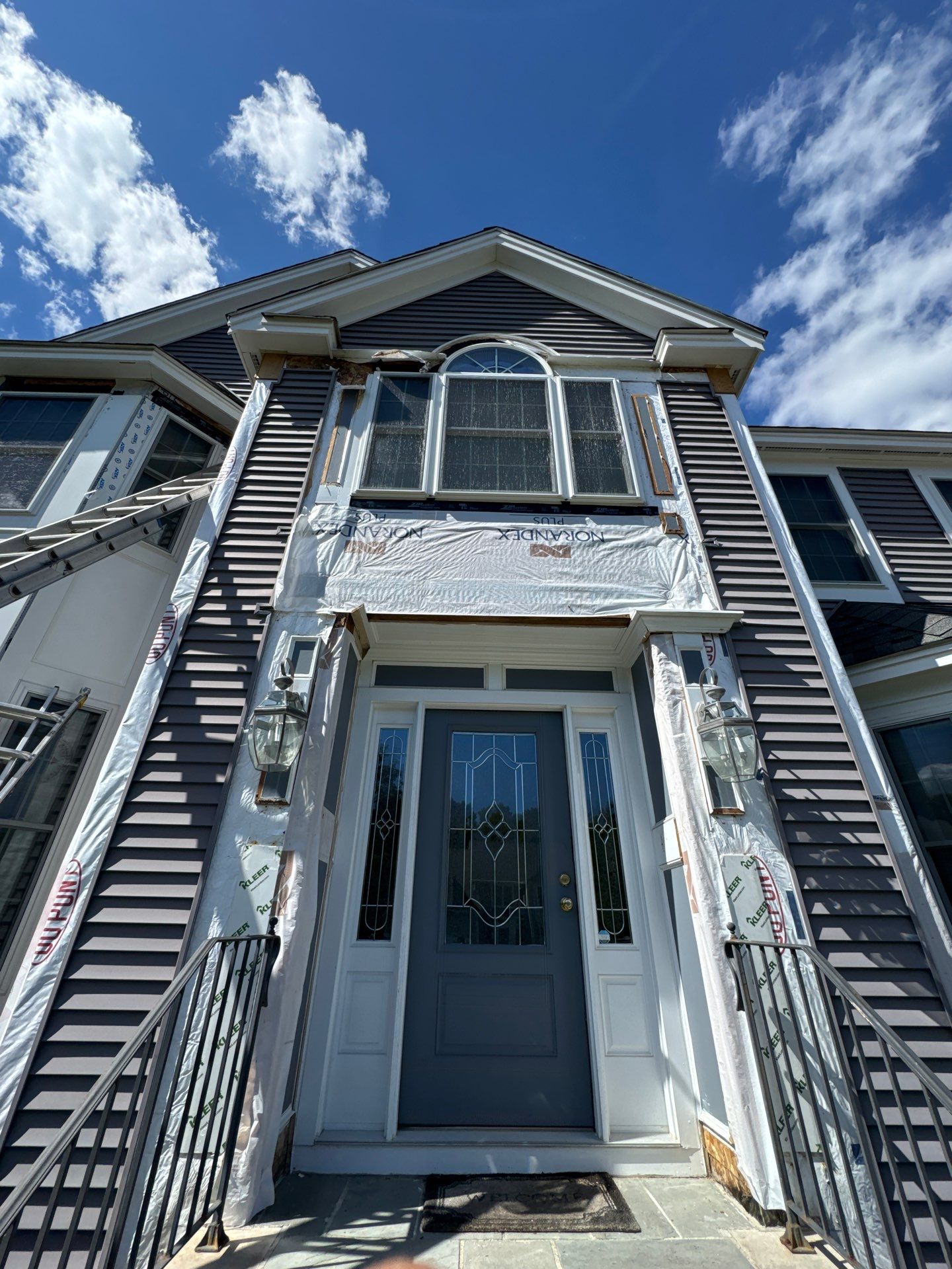 Roof, Trim, Deck, and Gutter Restoration by Mighty Dog Roofing of Greater Middlesex County