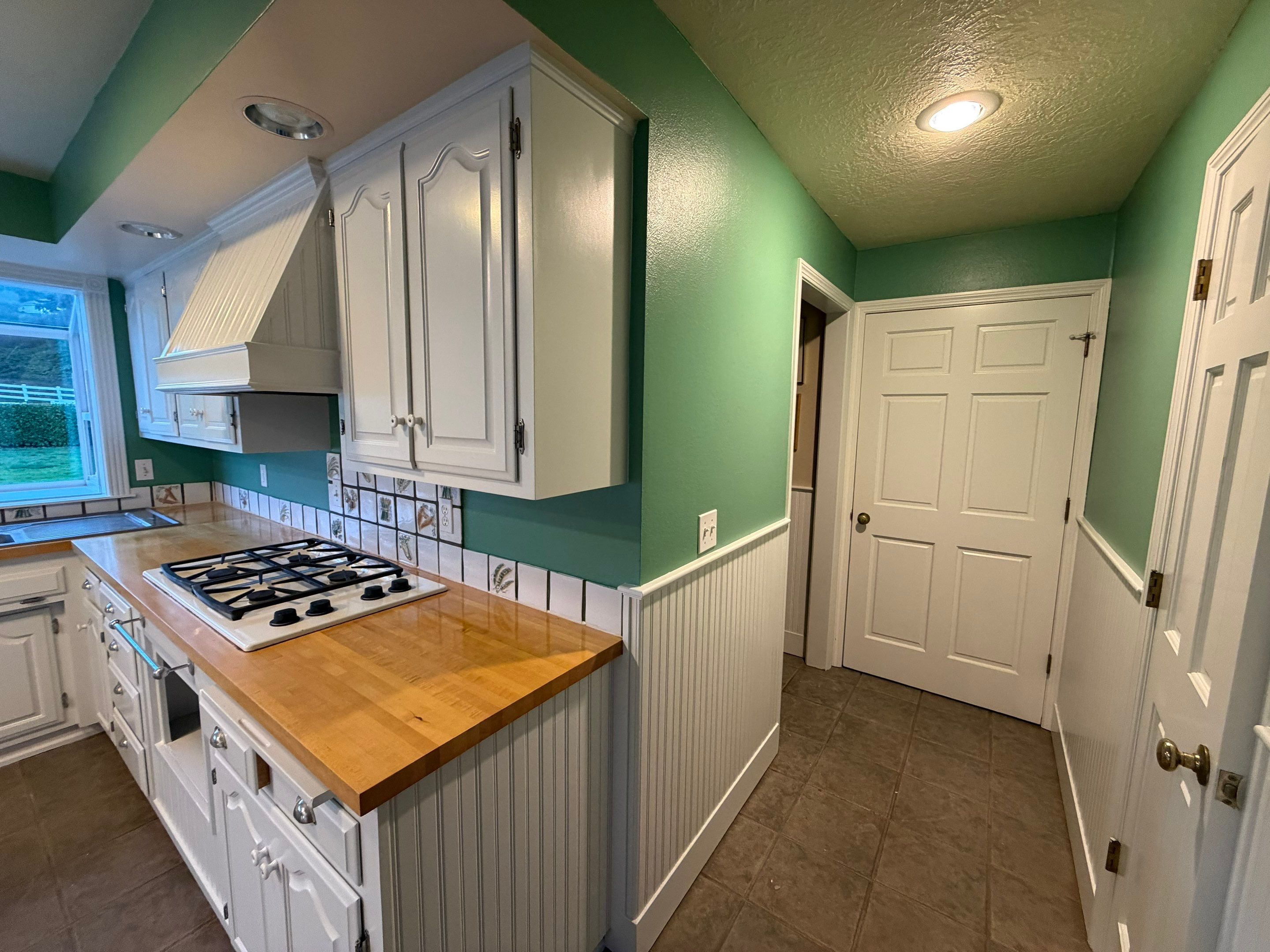 Kitchen Cabinets Painting by Handyman State LLC