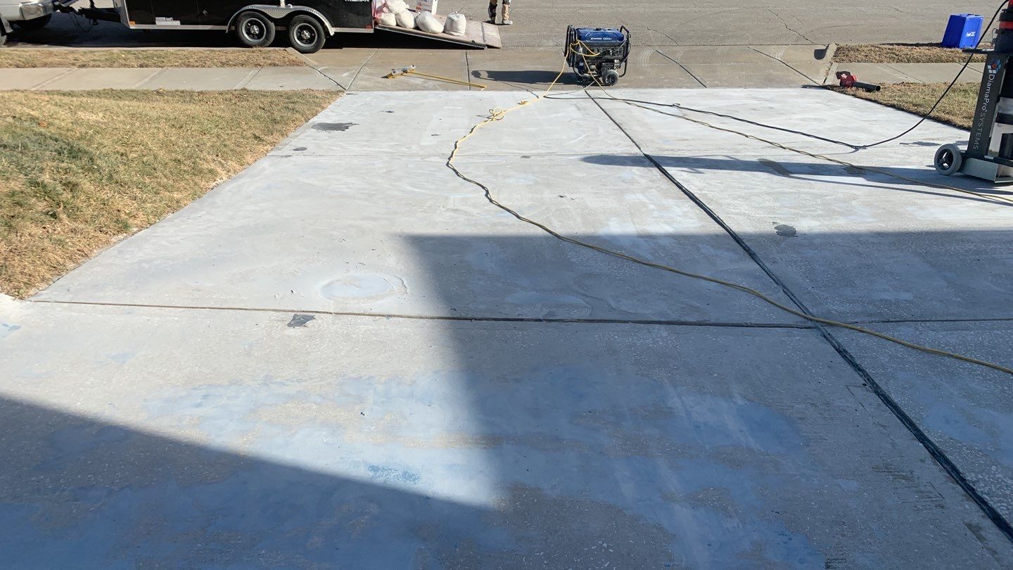 Driveway using Slate Stone by Select Painting, Coatings & Garage Cabinets