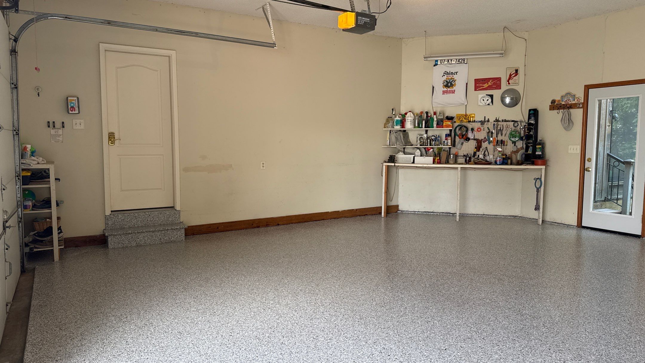 The Perfect Day To Install A Beautiful Coyote Flake Floor by Banner Garage