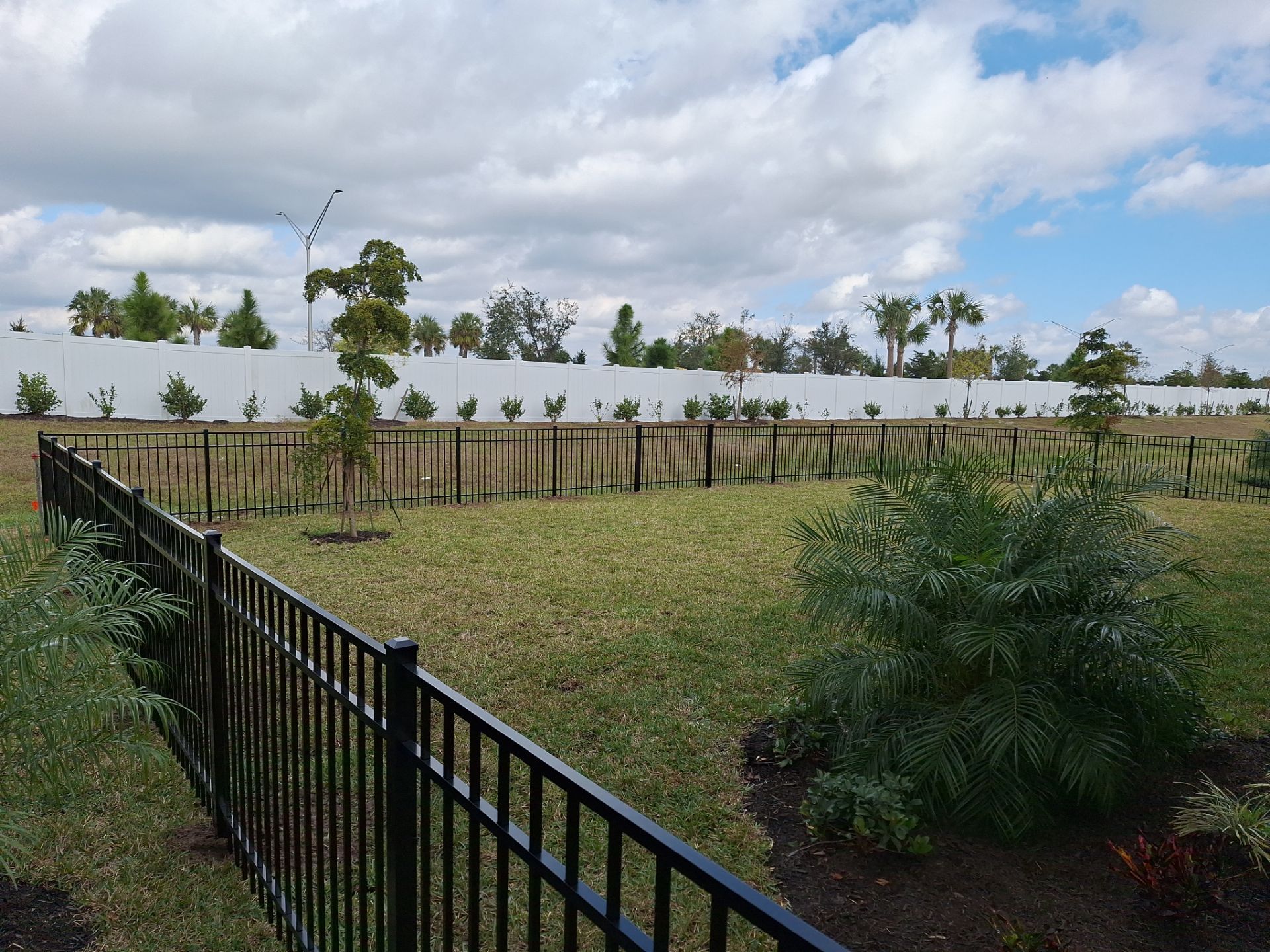 Aluminum Fence Installation using 4ft 3 Rail Black Aluminum Fence by Asap fence and gates, LLC