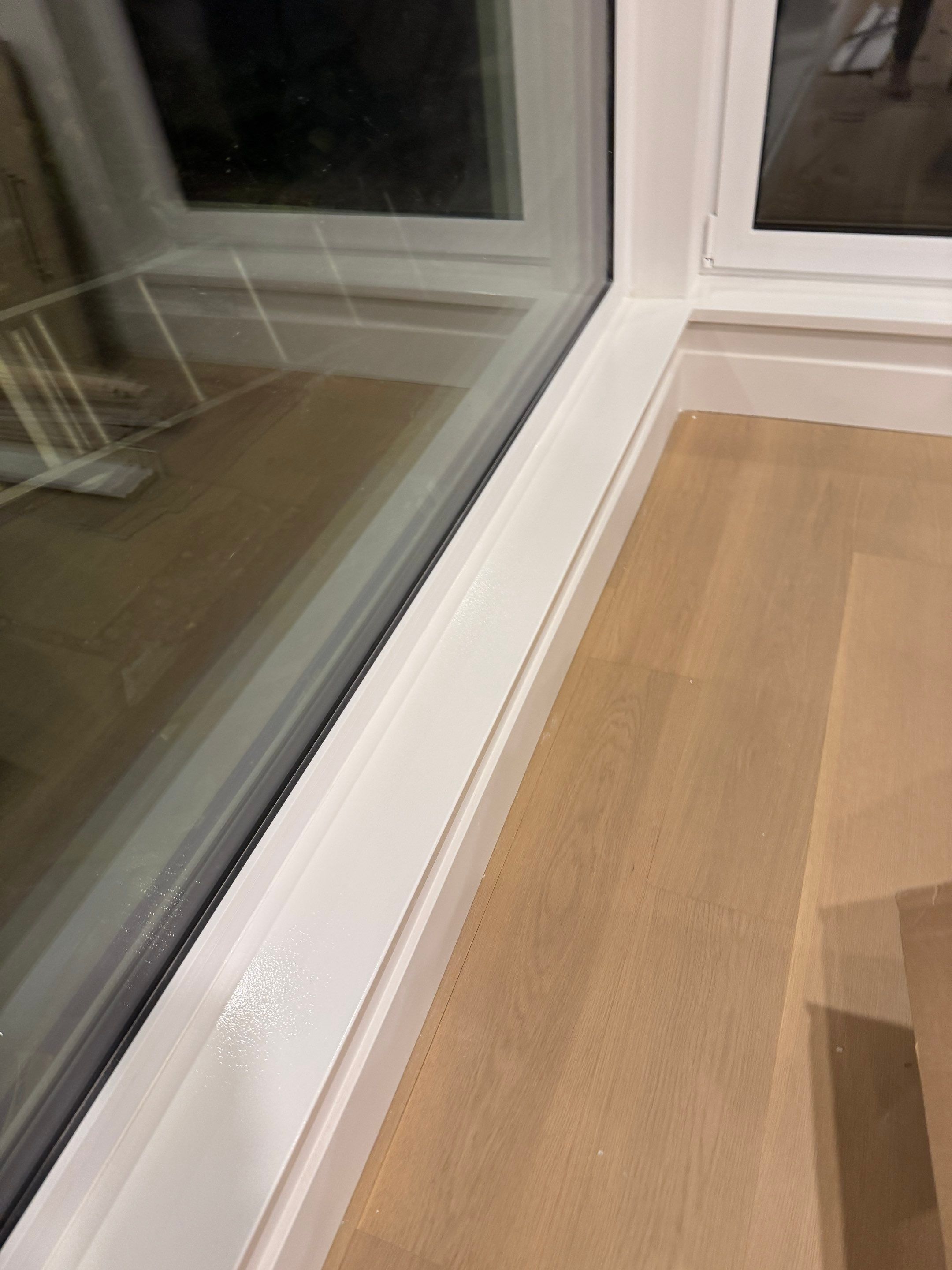 West Vancouver Custom Millwork: Heat Pump Trim & Window Finishing by YVR Construction Group