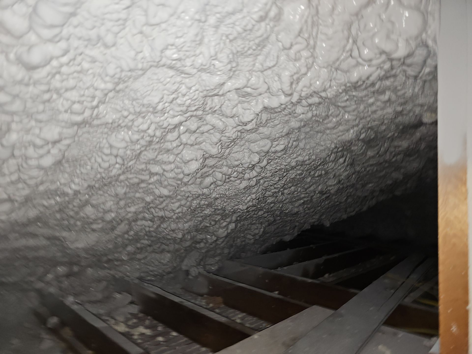 Attic Insulation using open cell spray foam by NYS Foam & Energy