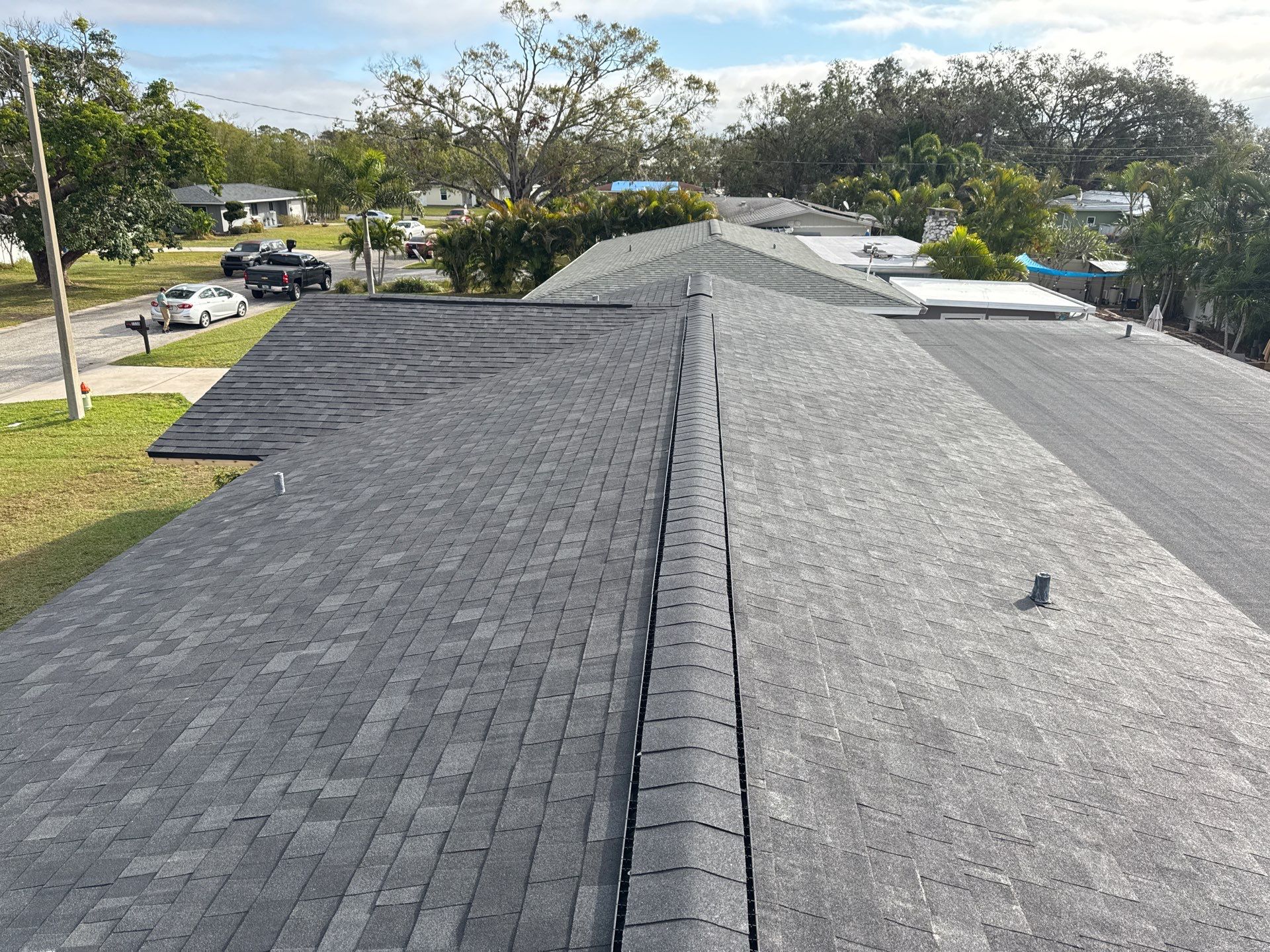 Onyx Black Shingles by Reimagine Roofing