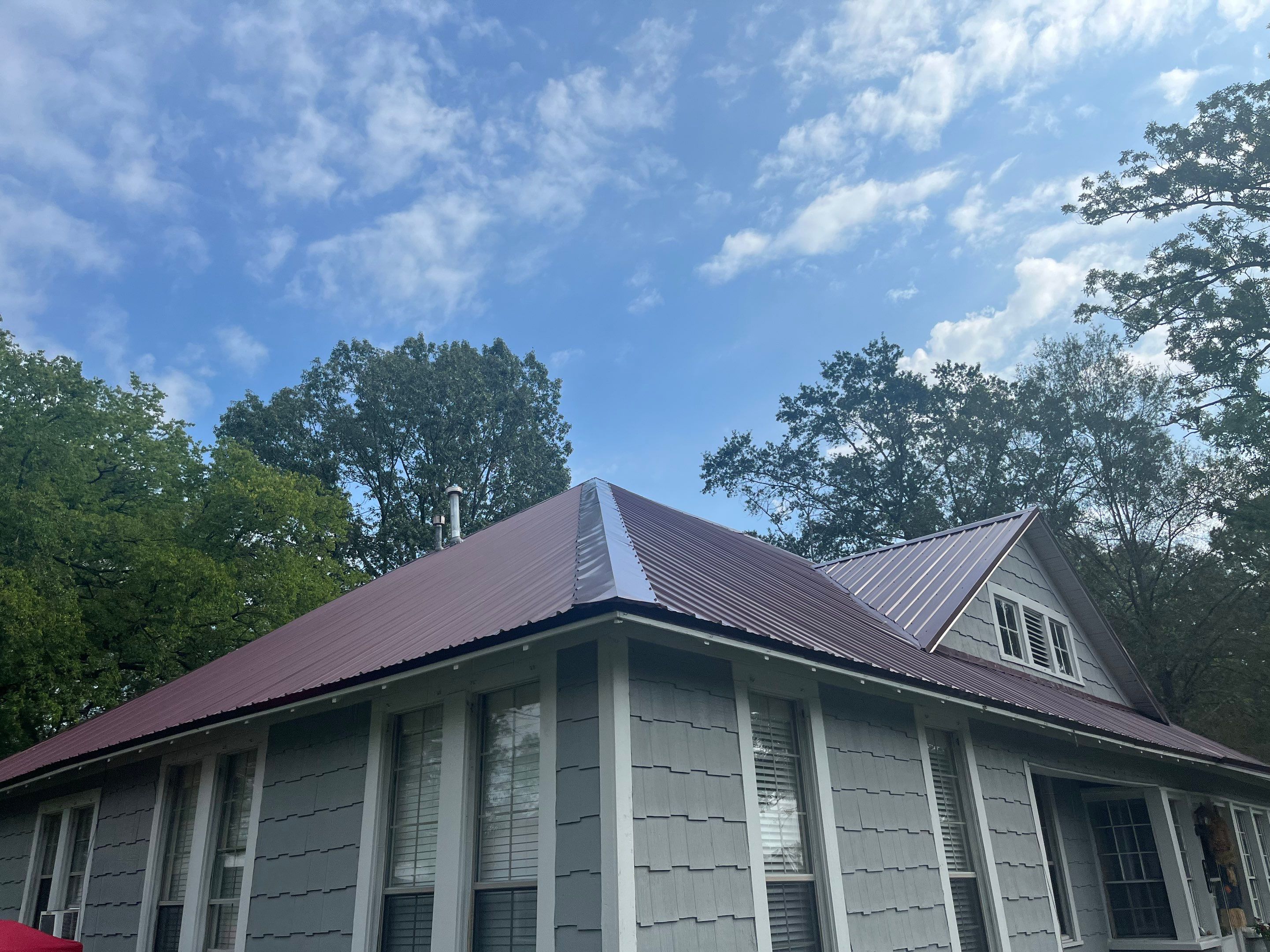 Residential Metal Roof Replacement using Reed's Metals: Colored Residental Panel (Burgundy) by Hostetler Roofing