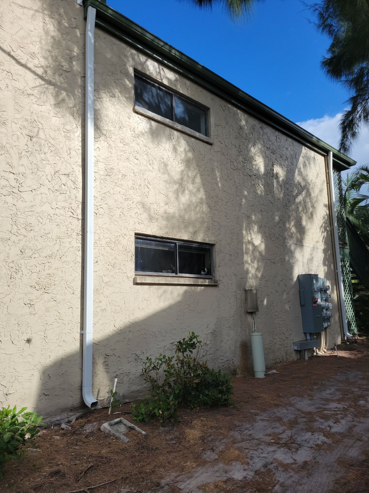 White Gutters Repair and Installation in Sarasota FL by Gutter Professors