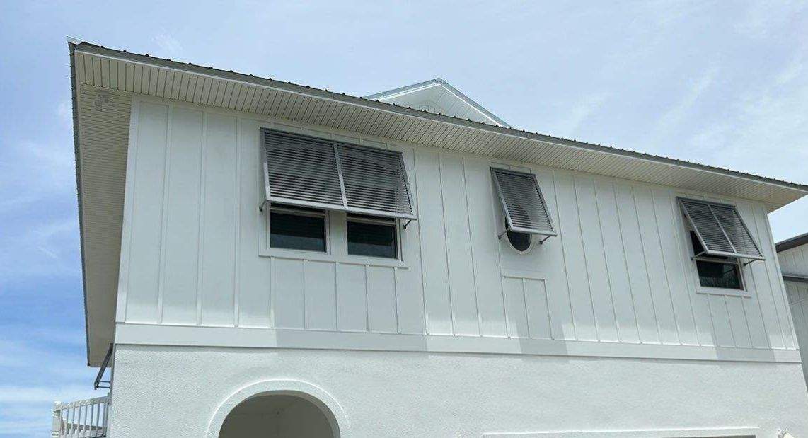 Bahama Shutters in Traffic Gray A by Smart Guard Shutters