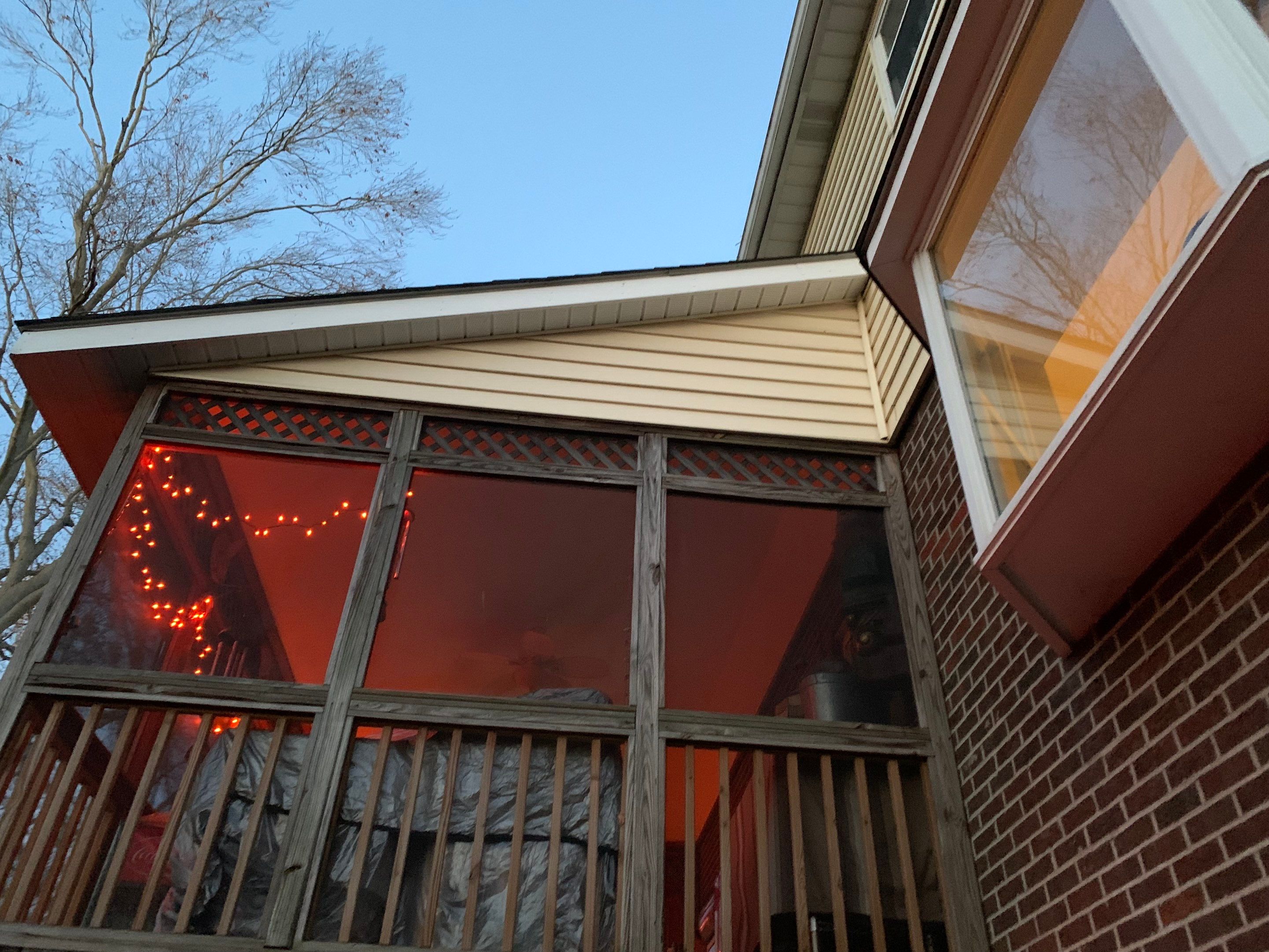 Replace dated vinyl siding with new white exterior Portfolio vinyl siding  by Secure Construction Company Inc