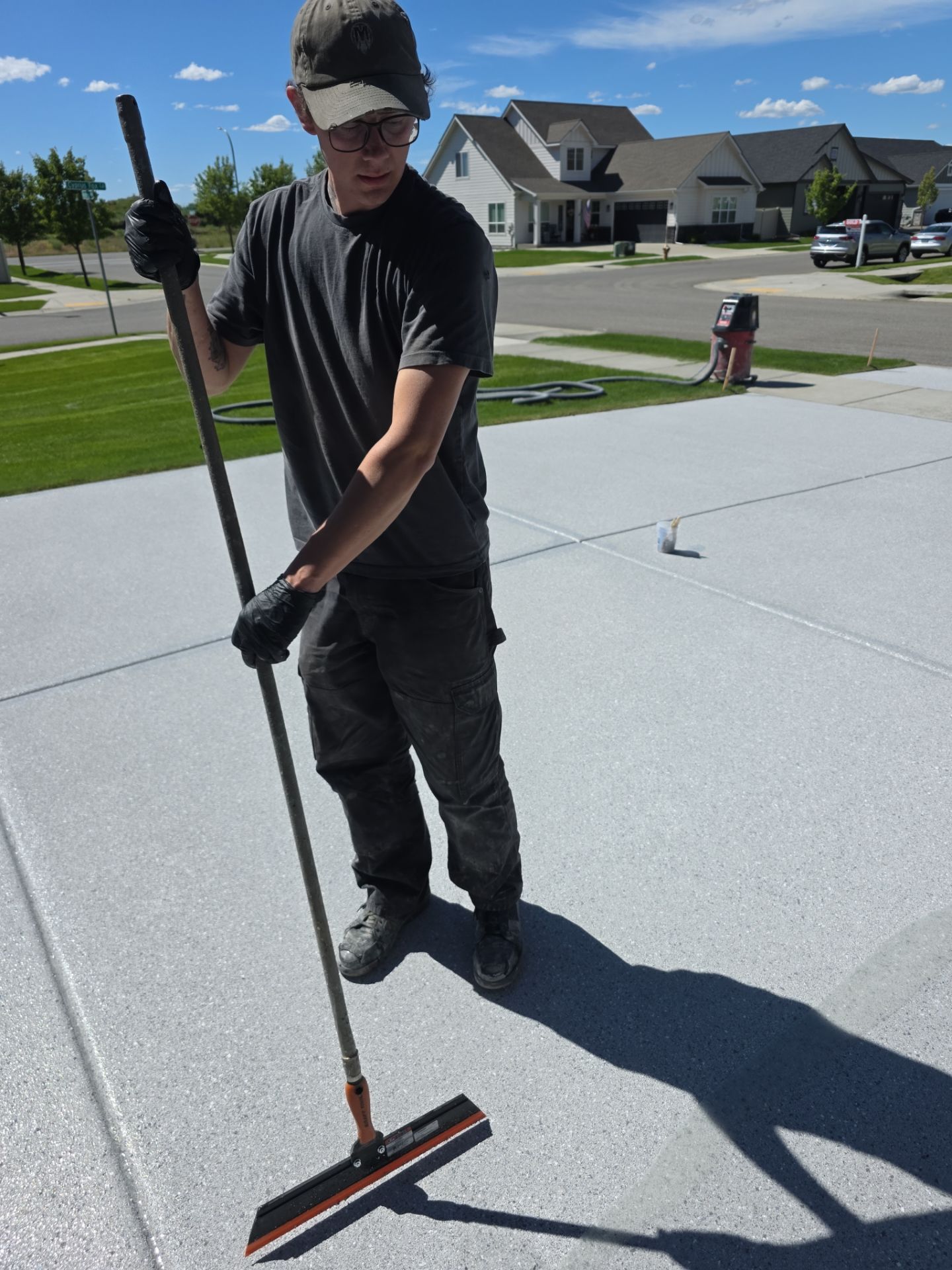 Battleship Hybrid Concrete Coating for Post Falls Patio and Driveway by Croc Coatings, LLC