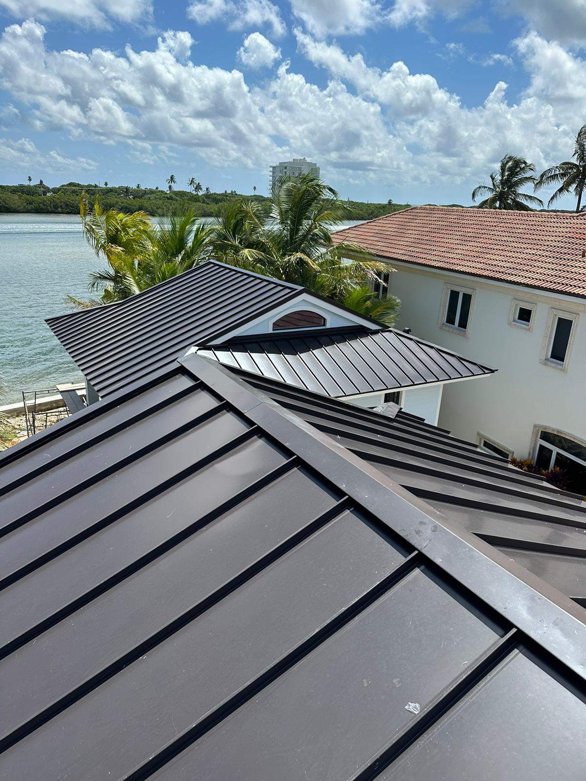 .040 Aluminum 1.5" Mechanical Seam Dark Bronze  by Total Roofing System The Metal Roof Experts