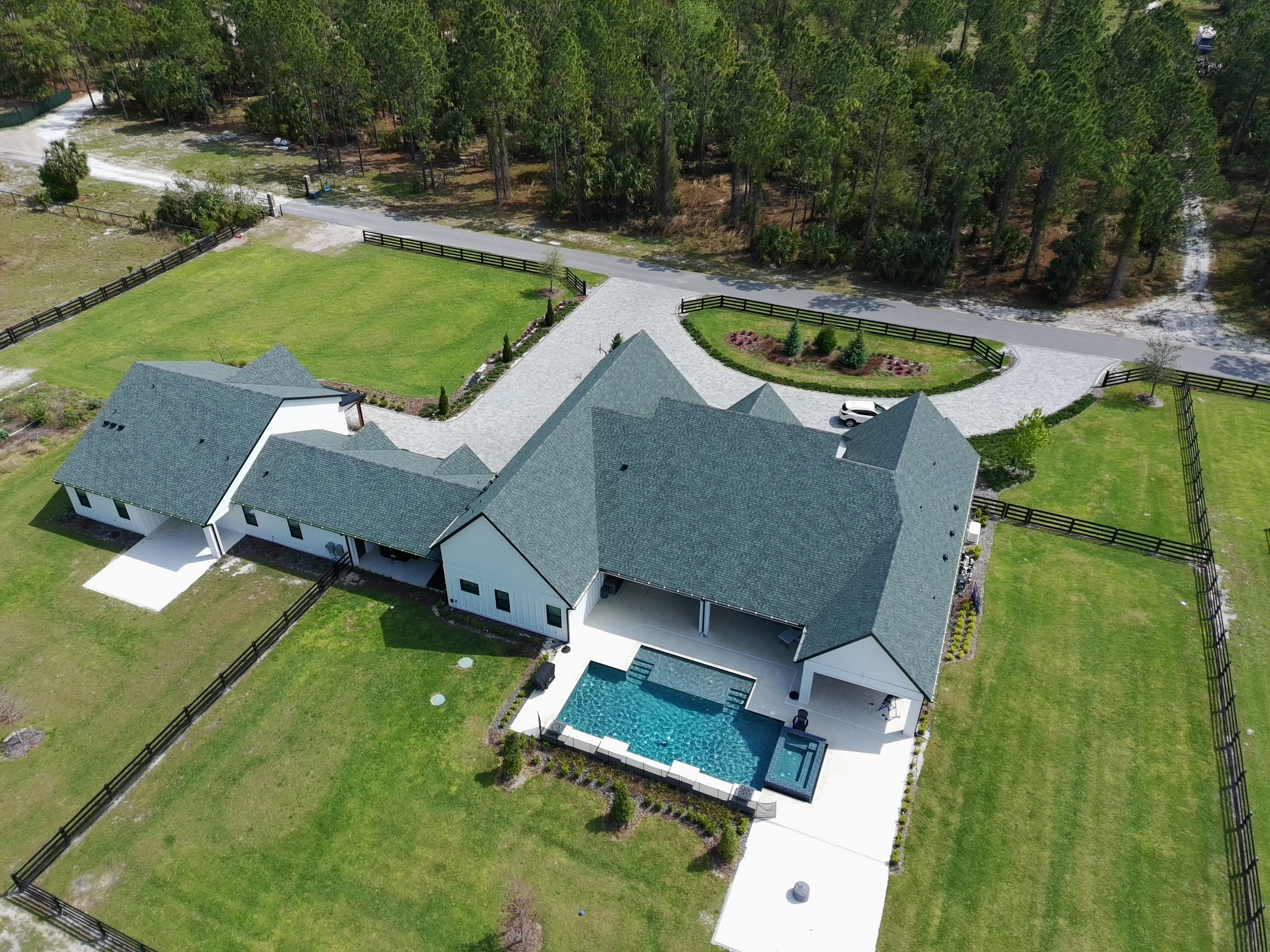 Custom Post-Frame Horse Barn and Shingle Roof Installation in Geneva by Fortified Roofing Solutions Corp.