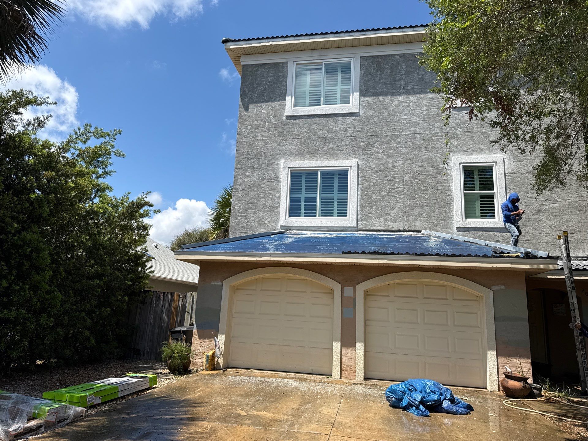 Flagler Beach Residential Tile Roof Replacement with Dark Barrel Tiles by Fortified Roofing Solutions Corp.