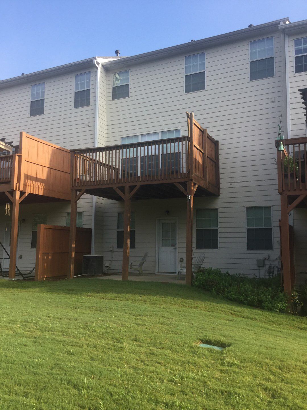 Elevated Pressure-Treated Wood Deck Replacement for Atlanta Townhome by Swift Home Renovations