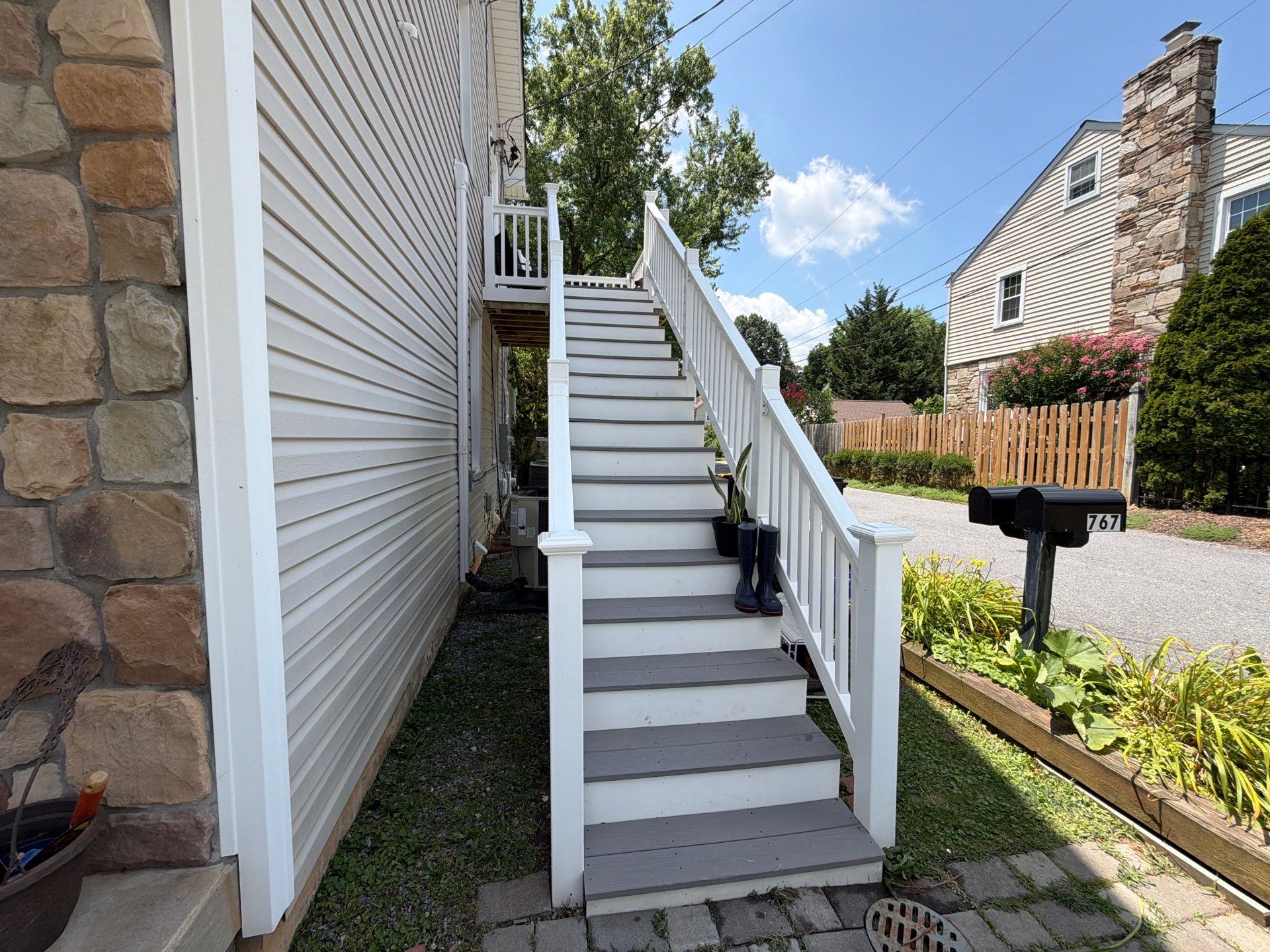 Whole-Property House Washing for Vinyl Siding and Stone Accents in Sykesville by Baltimore Pressure Washers Inc.