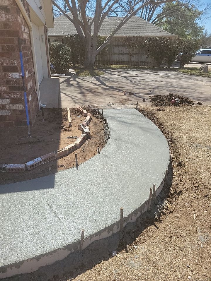 Concrete sidewalk using Concrete by Clays Services Inc
